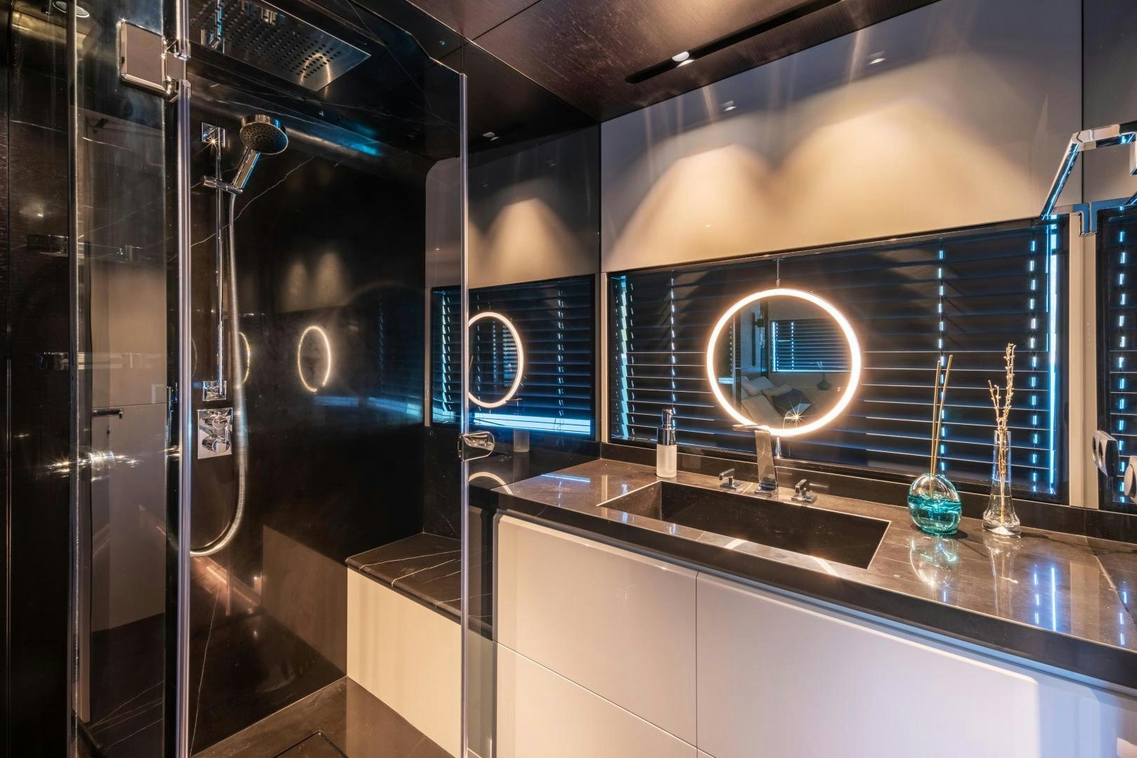 a bathroom with a large mirror aboard EDGE   NB 201 Yacht for Sale