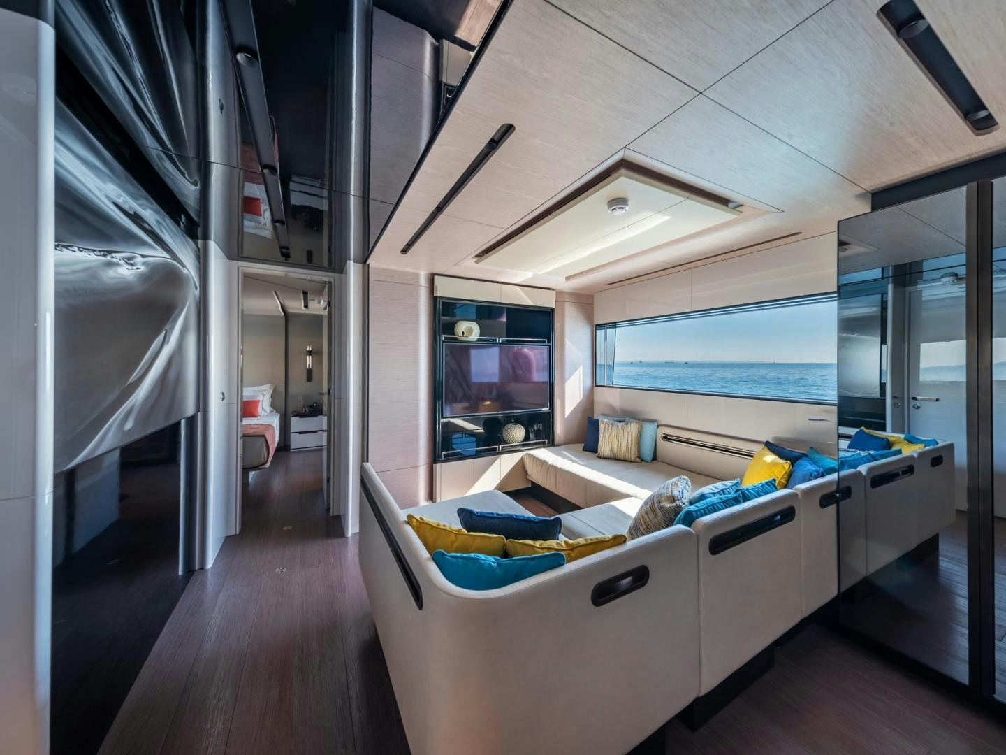 a room with a bed and a large window aboard EDGE   NB 201 Yacht for Sale