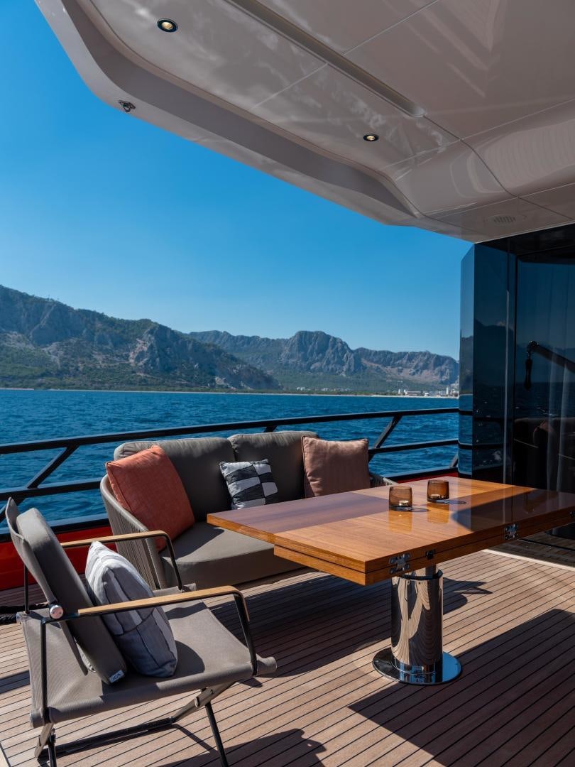 a couch and table on a boat aboard EDGE   NB 201 Yacht for Sale