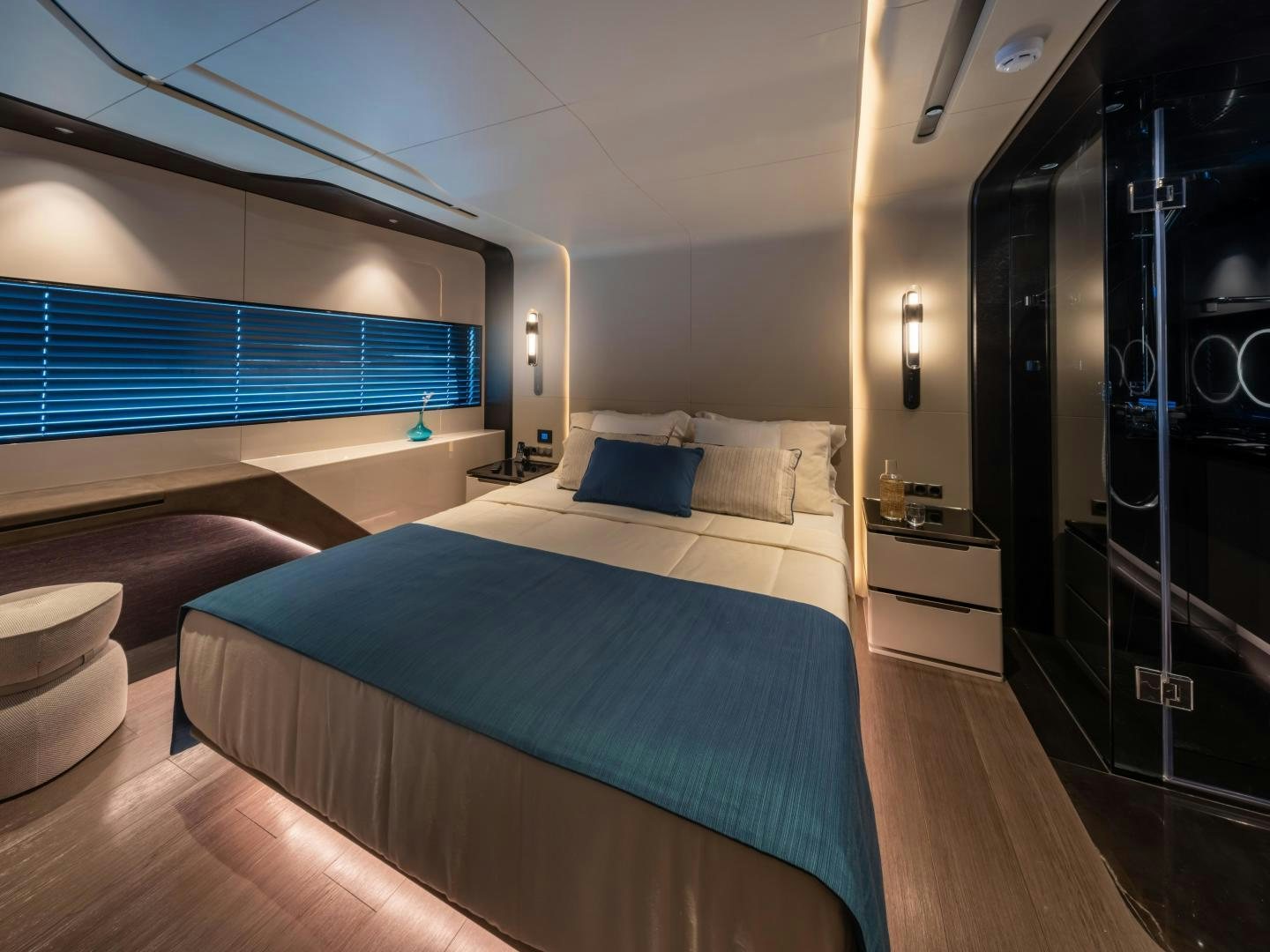 a bedroom with a bed and a desk aboard EDGE   NB 201 Yacht for Sale