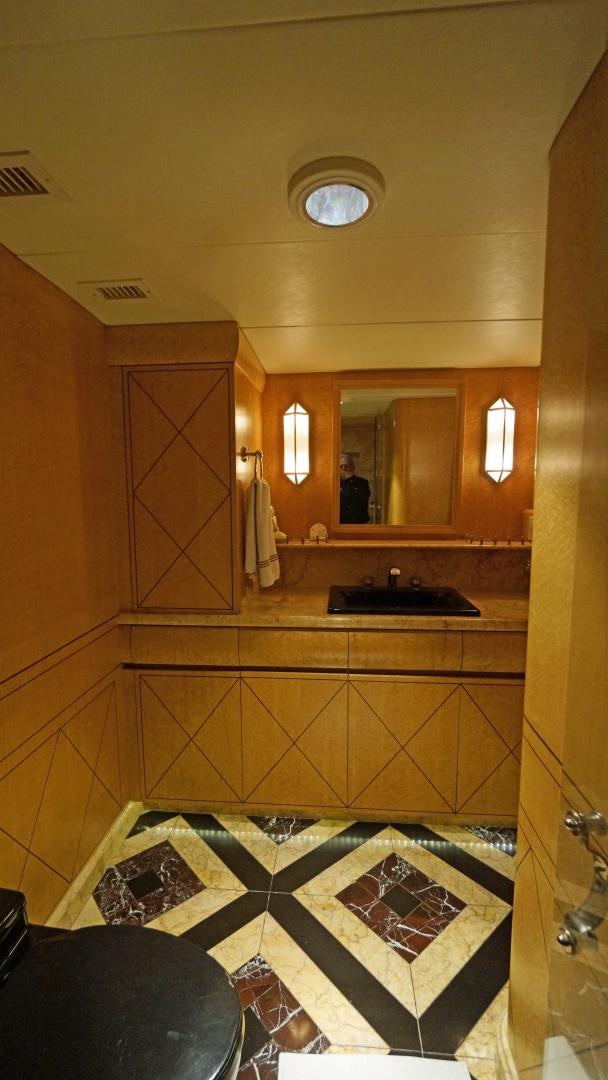 a bathroom with a large mirror aboard LAID BACK Yacht for Sale