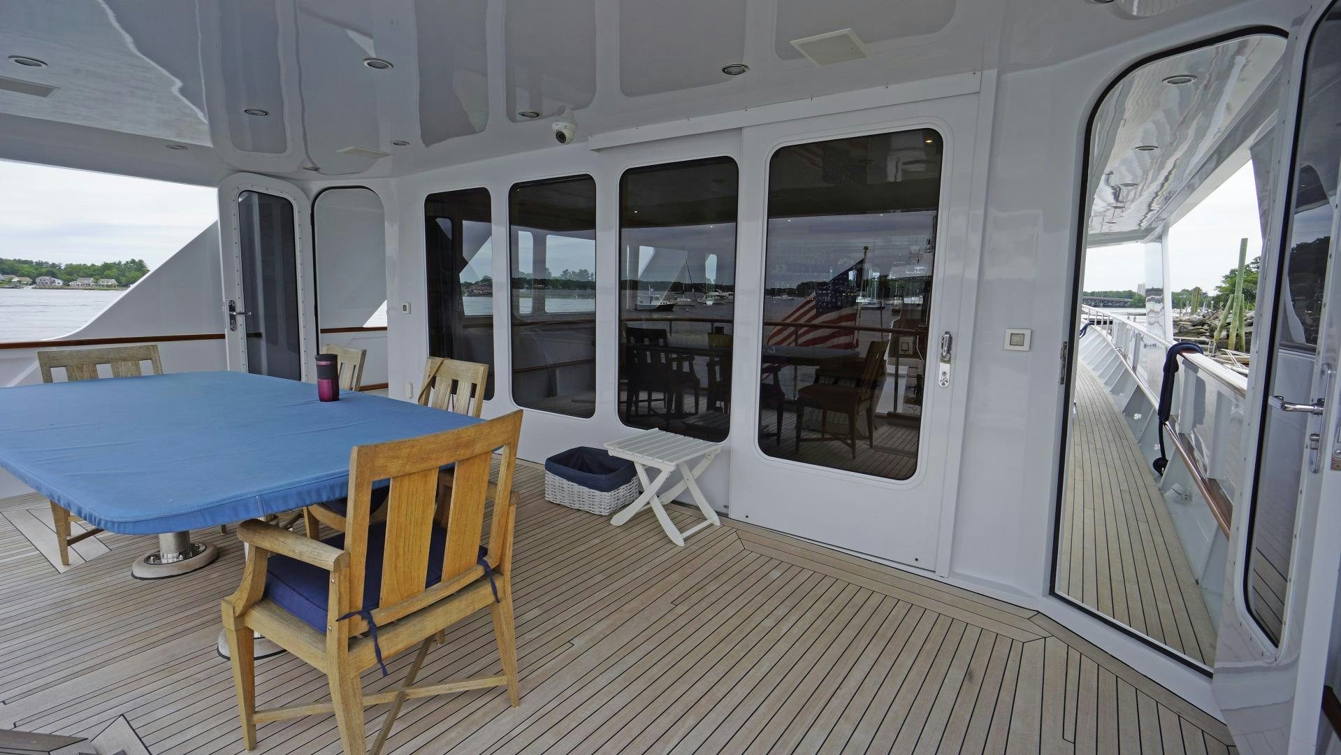a table and chairs on a boat aboard LAID BACK Yacht for Sale