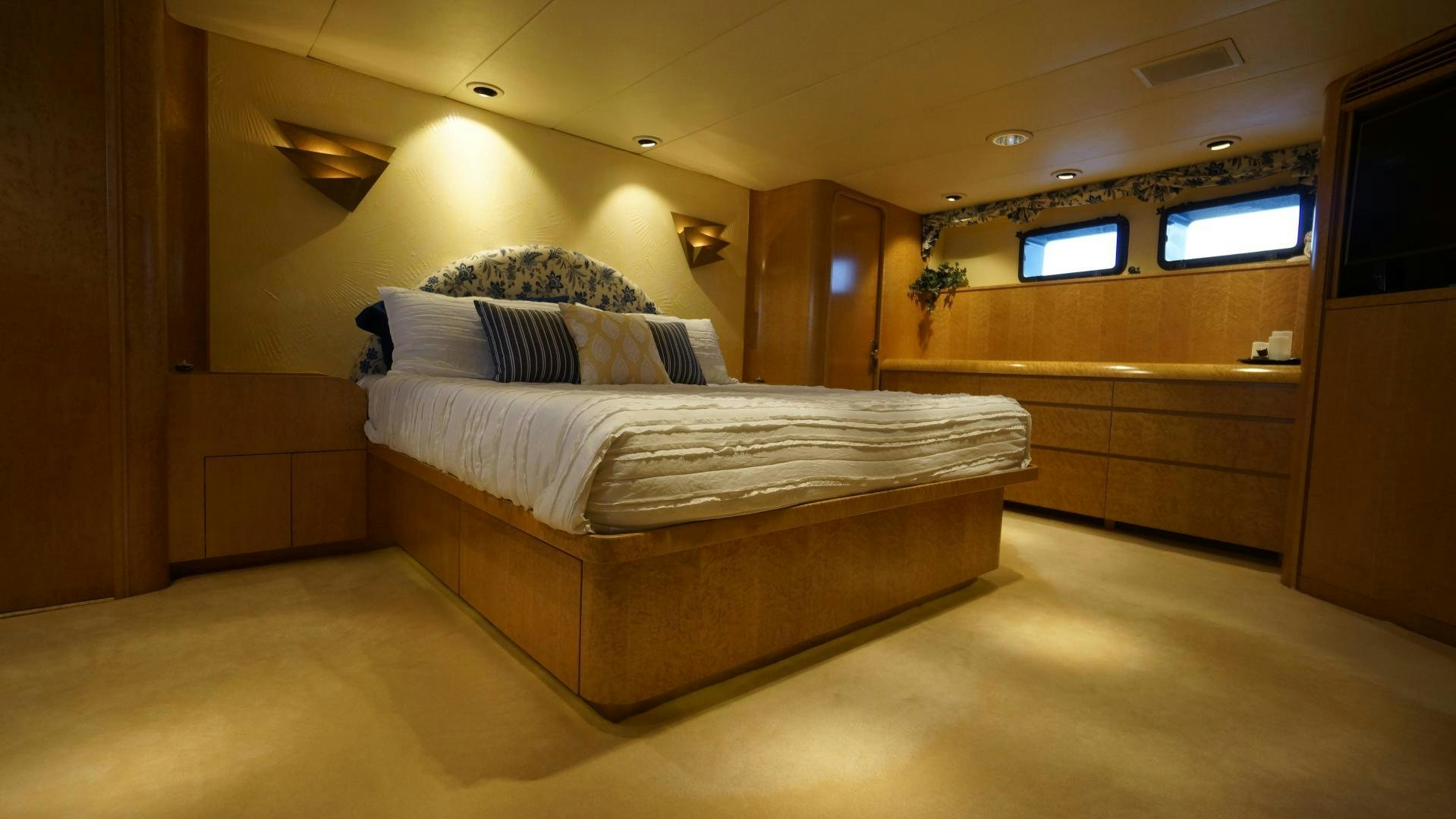 a room with a bed and a tv aboard LAID BACK Yacht for Sale