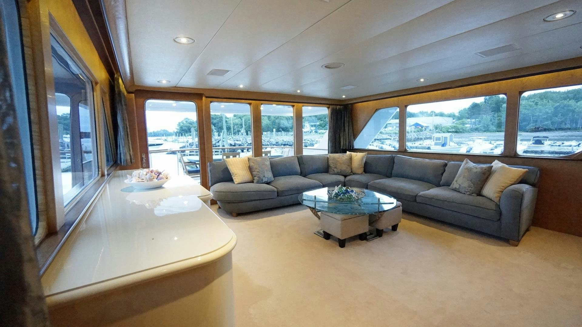 a living room with a large window aboard LAID BACK Yacht for Sale