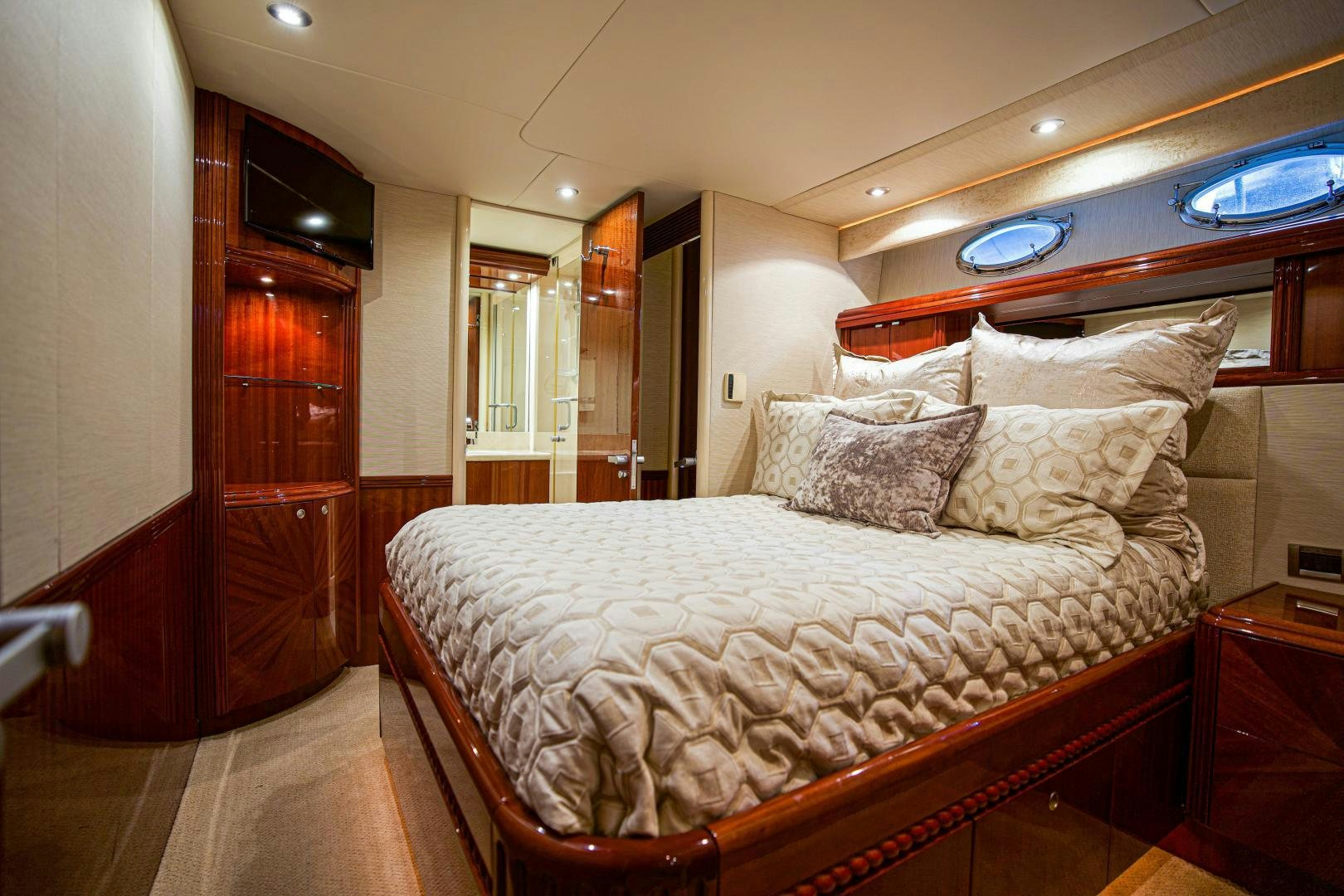 a bed in a room aboard new horizon Yacht for Sale