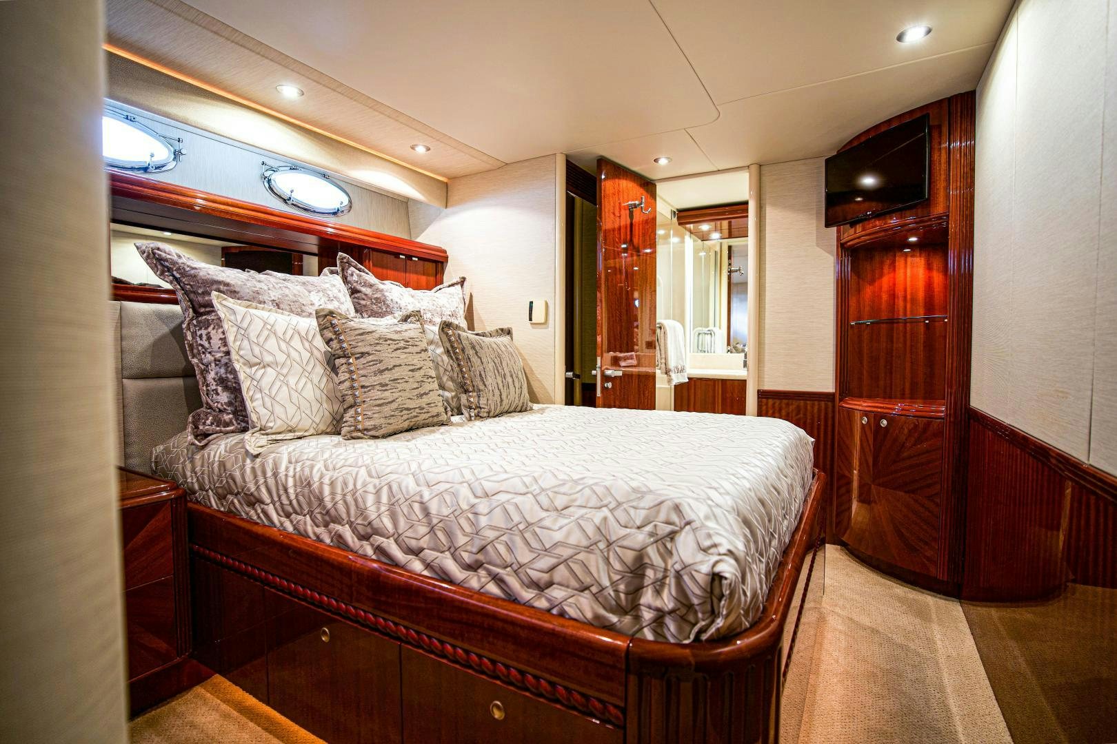 a bed in a room aboard new horizon Yacht for Sale