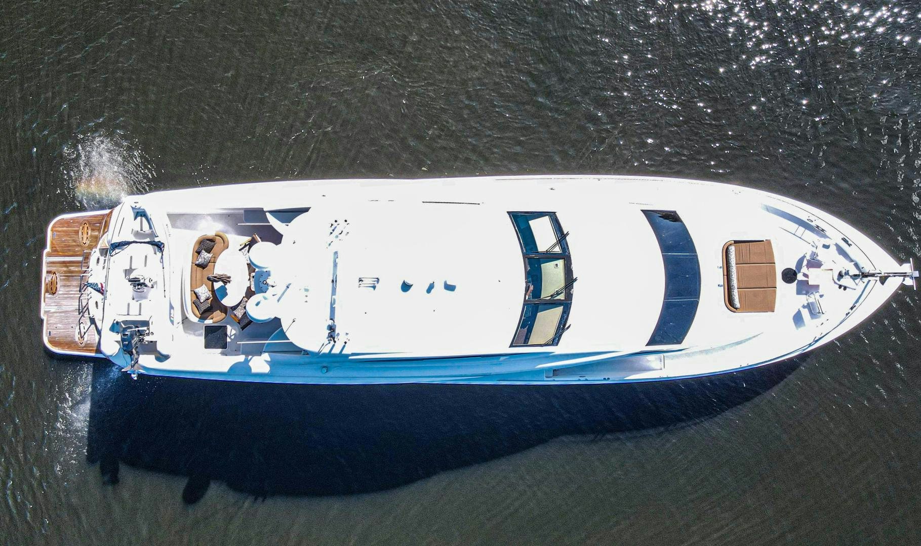 a blue and white boat aboard new horizon Yacht for Sale