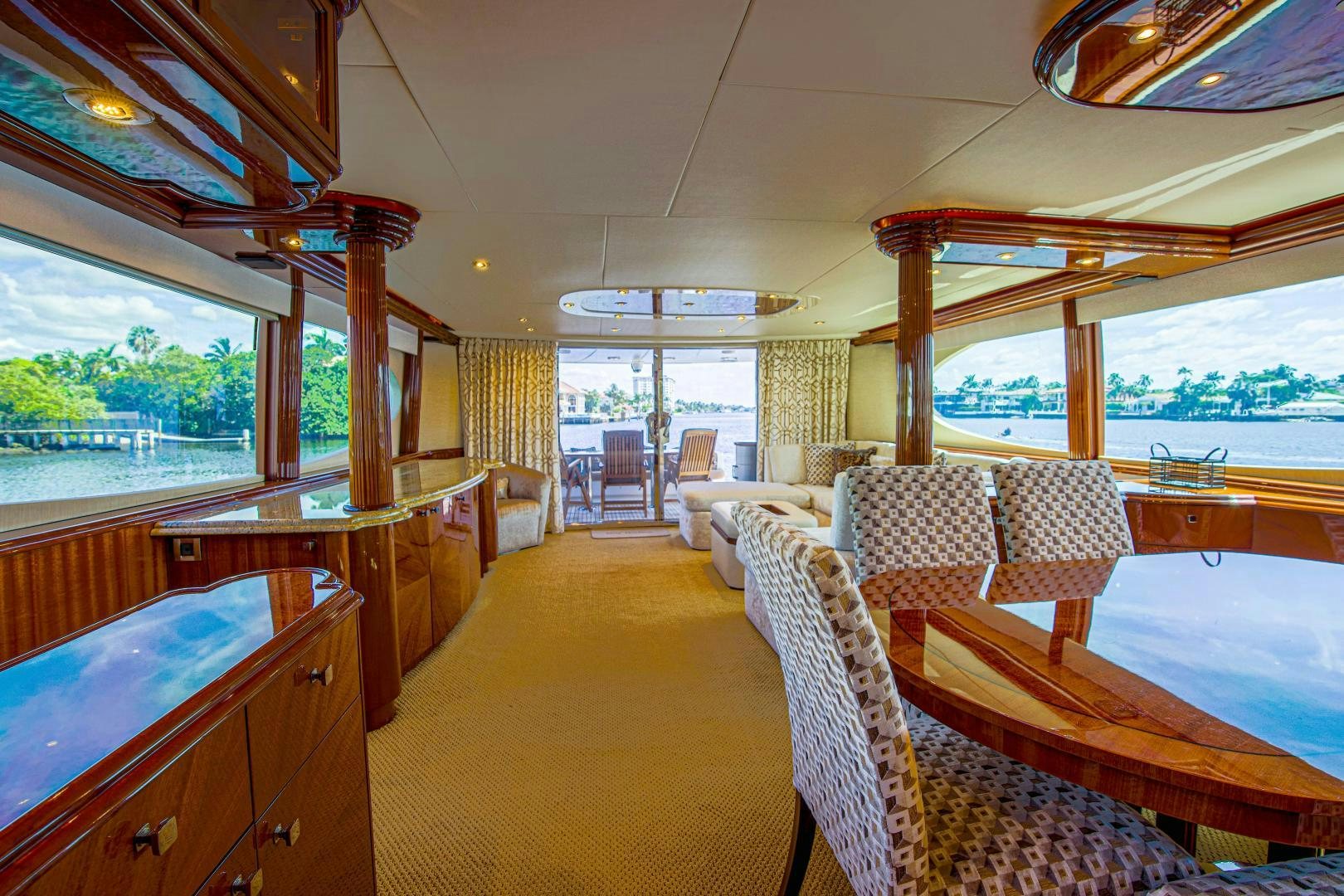 a large room with a large window aboard new horizon Yacht for Sale