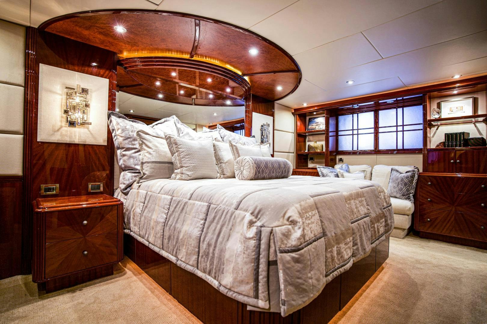 a bed in a room aboard new horizon Yacht for Sale