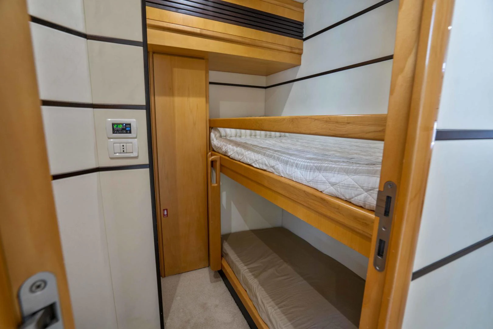 a bunk bed in a room aboard DENISE Yacht for Sale