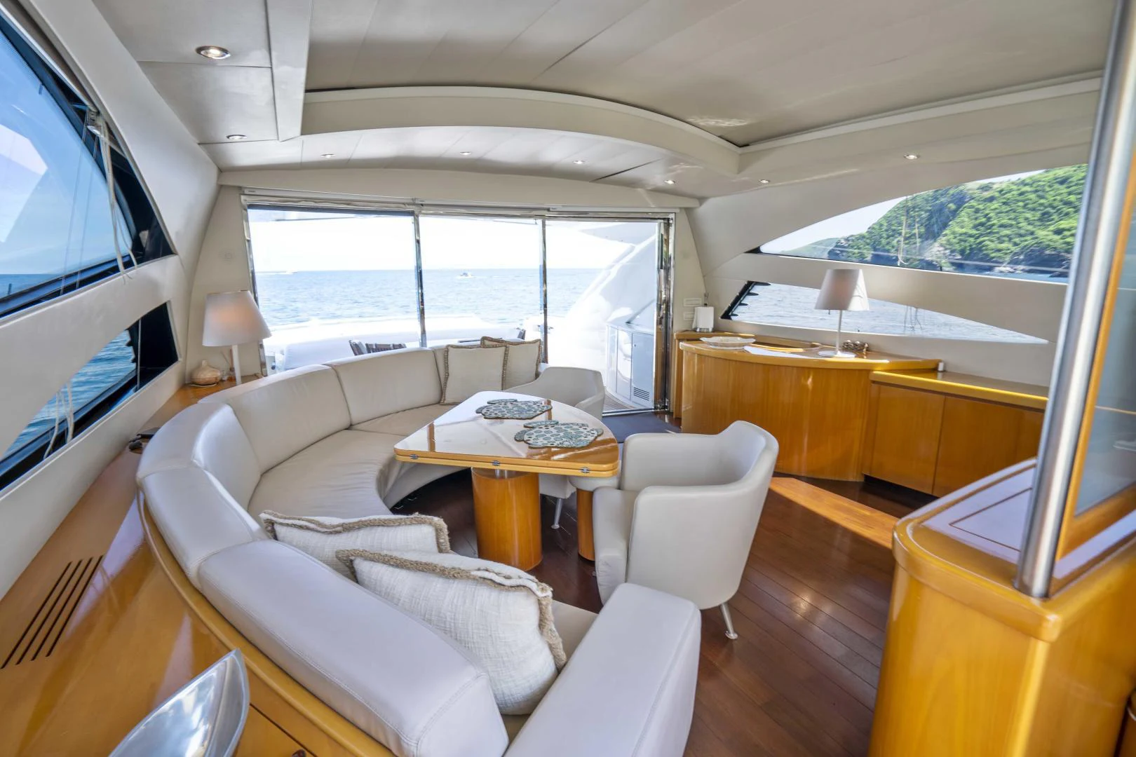 a living room with a large window aboard DENISE Yacht for Sale