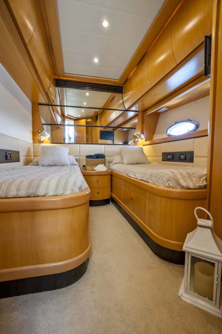 a room with two beds aboard DENISE Yacht for Sale