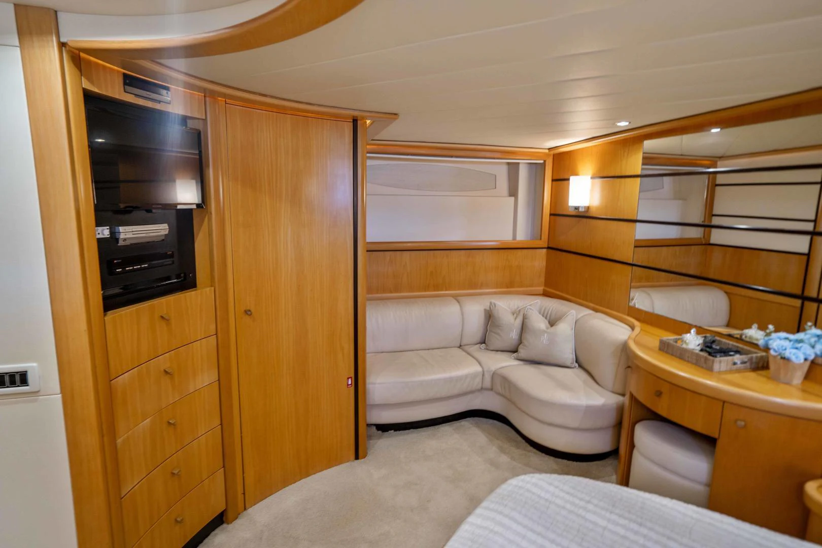 a room with a bed and a desk aboard DENISE Yacht for Sale