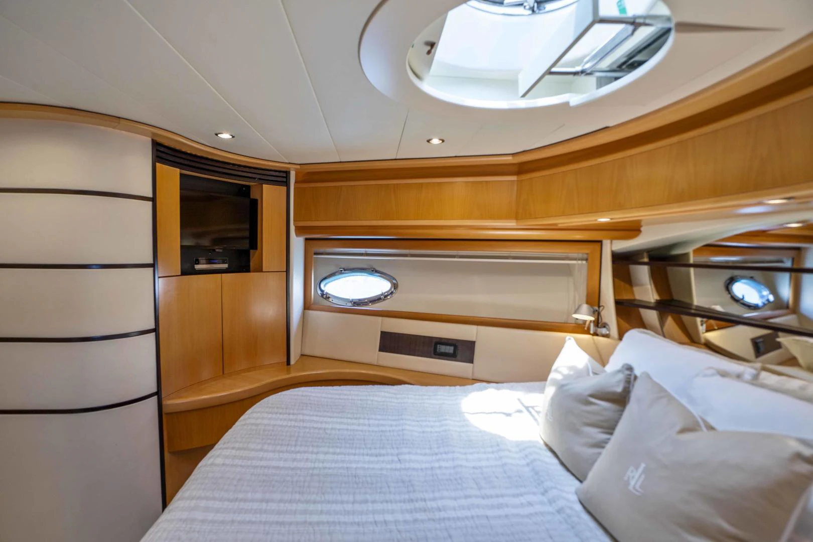 a room with a bed and a shelf aboard DENISE Yacht for Sale