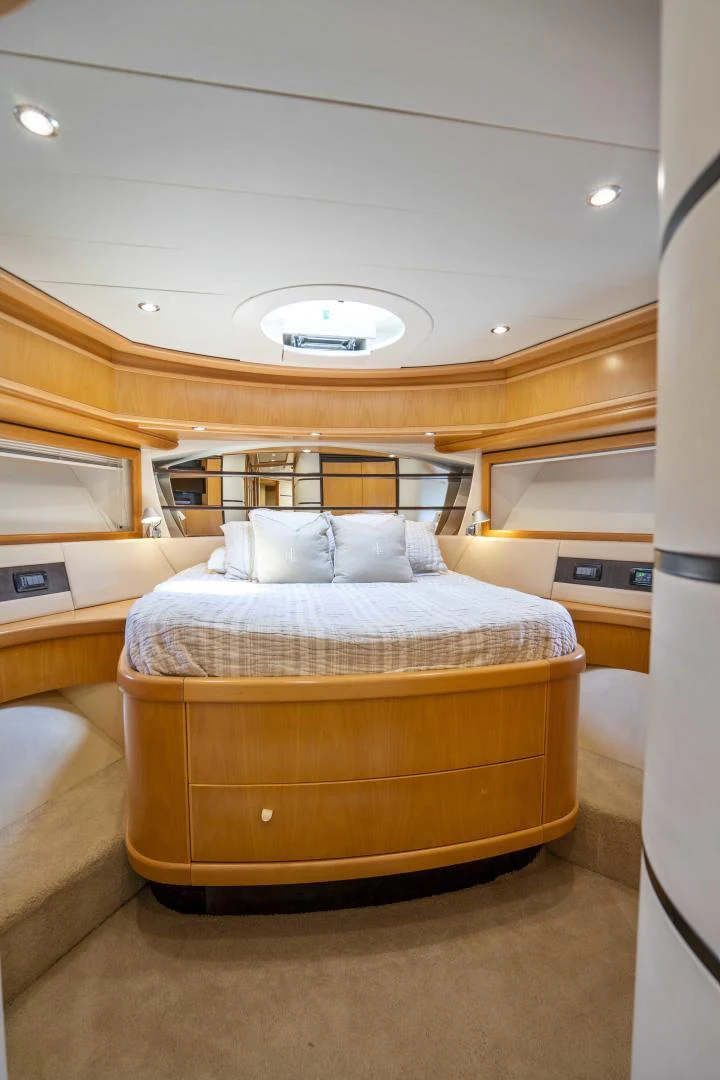 a bed in a room aboard DENISE Yacht for Sale