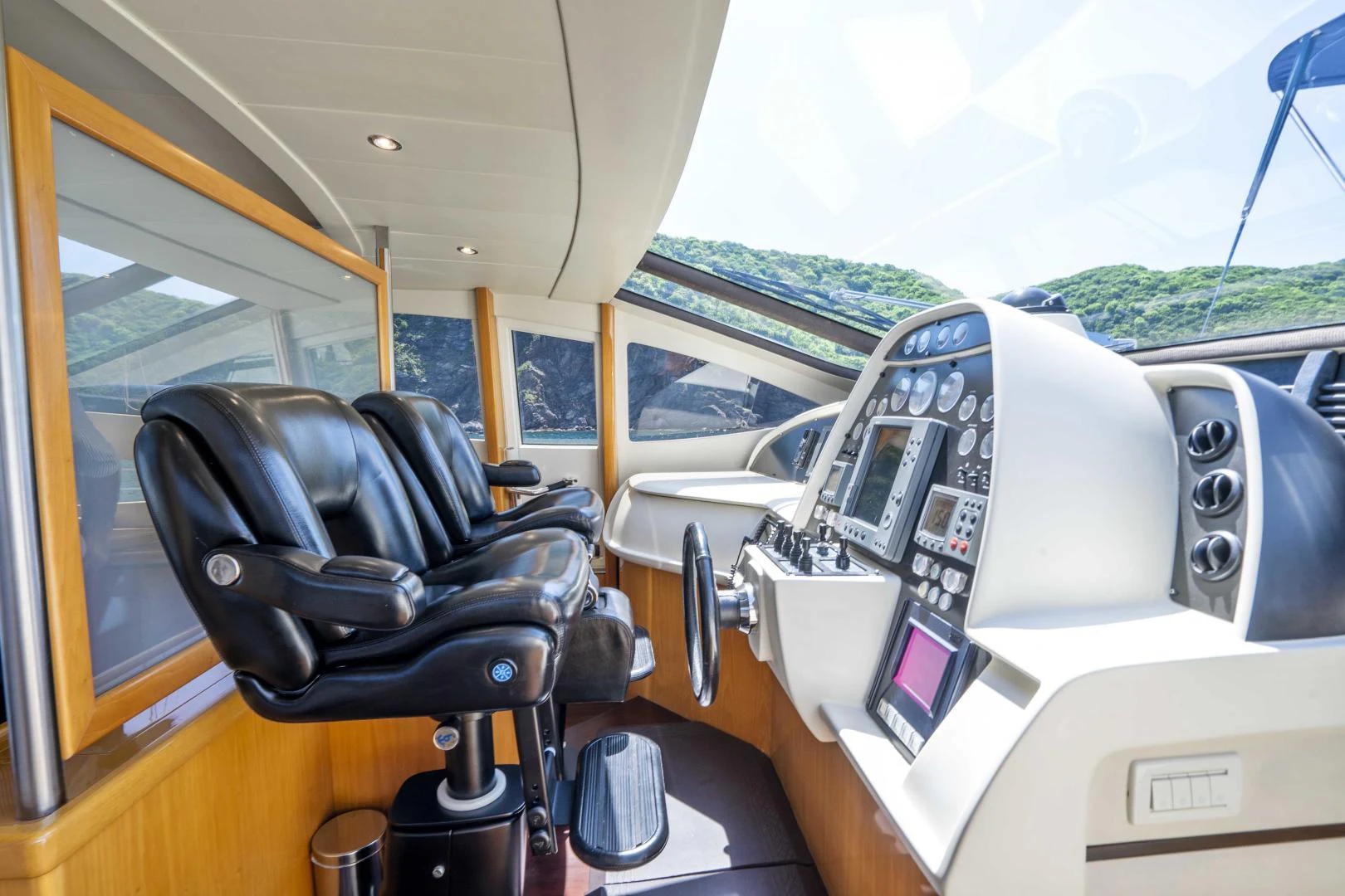 inside of a car aboard DENISE Yacht for Sale