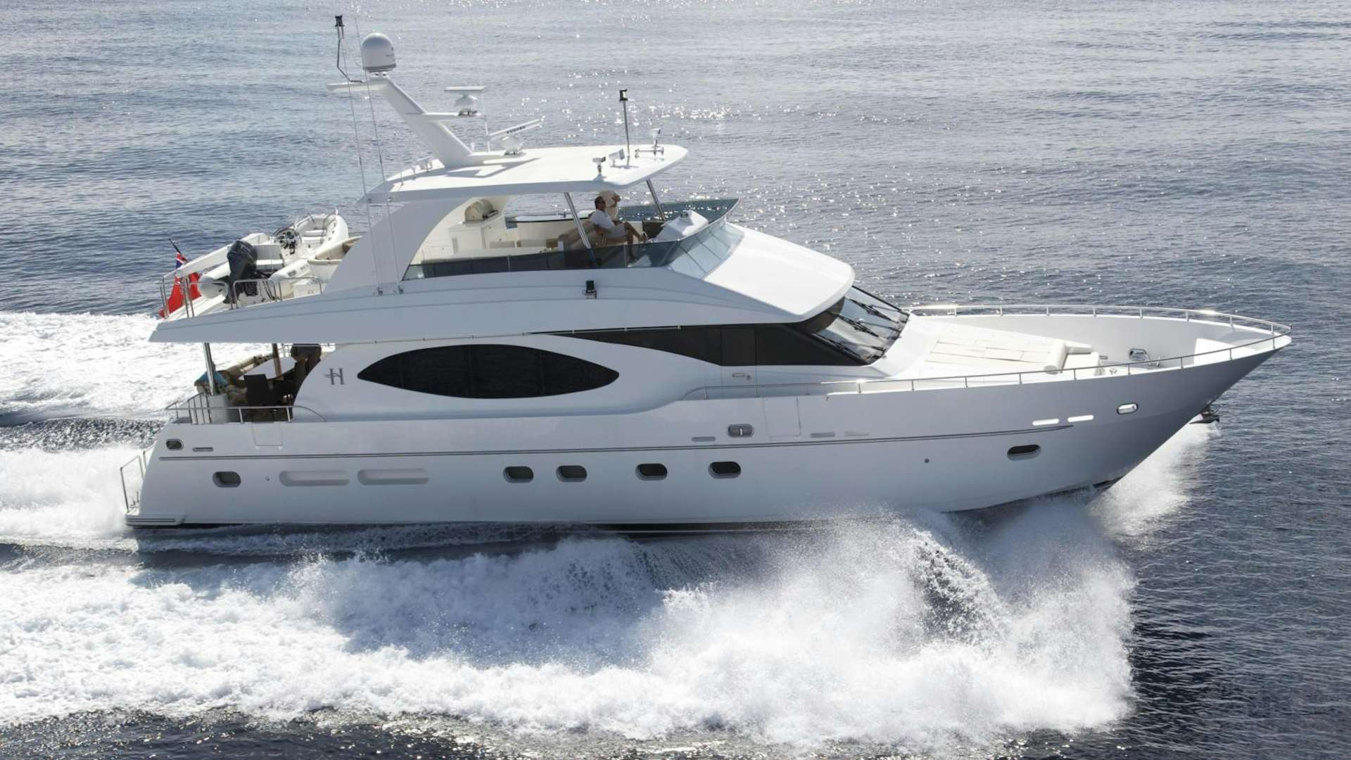a white yacht on the water aboard LADY C II Yacht for Sale