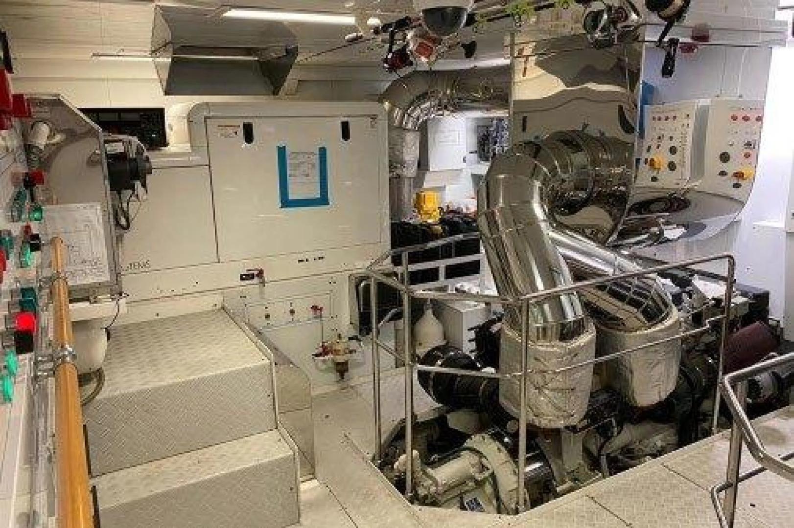 a room with machinery aboard YES Yacht for Sale