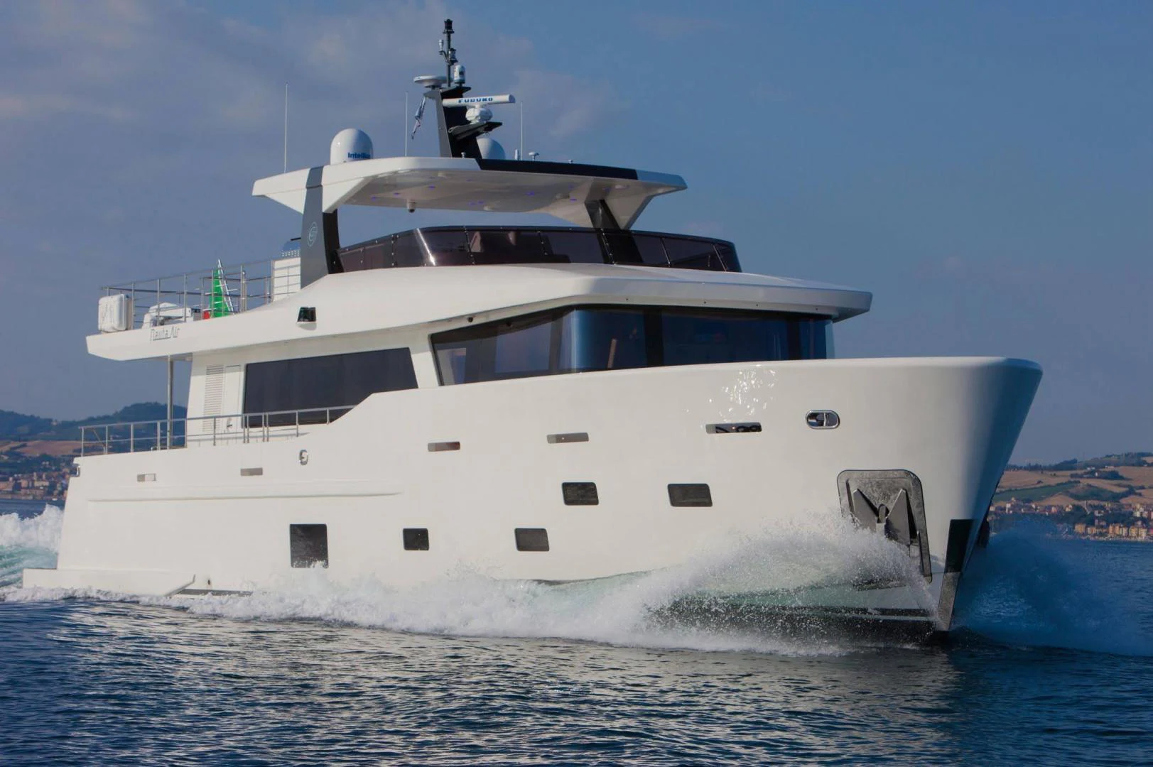 a white yacht in the water aboard YES Yacht for Sale