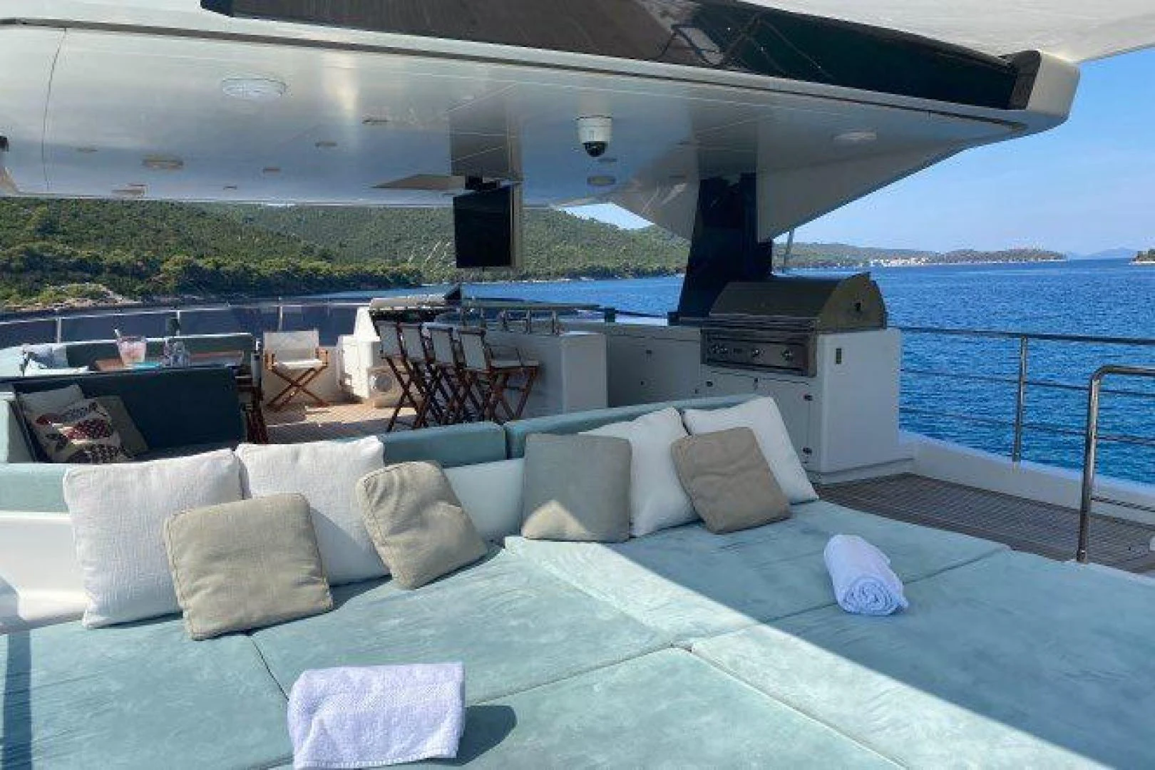 a lounge area with a large pool aboard YES Yacht for Sale