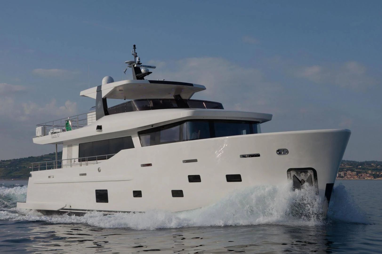 a white yacht with a white front aboard YES Yacht for Sale