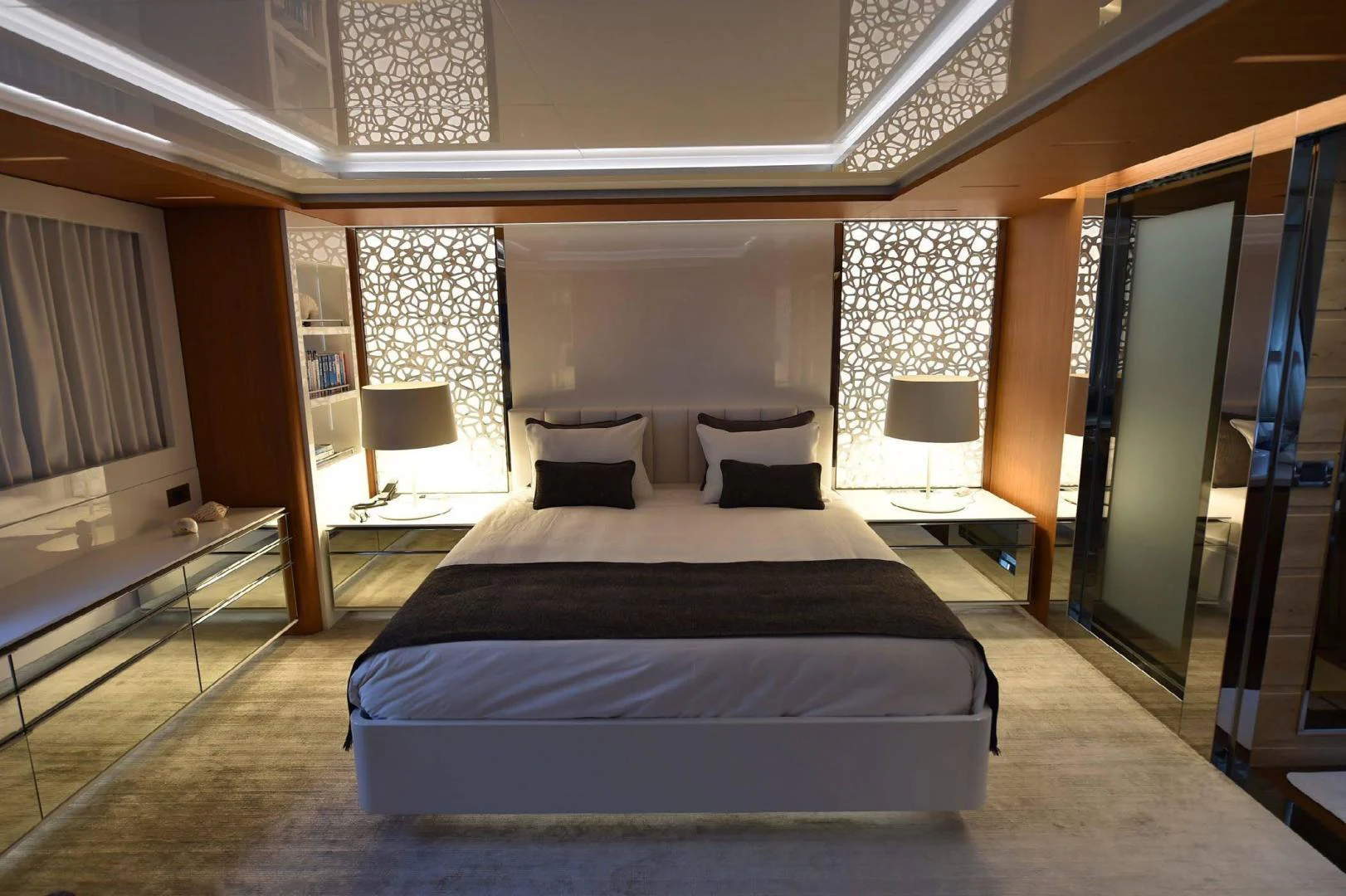 a large bedroom with a large bed aboard YES Yacht for Sale