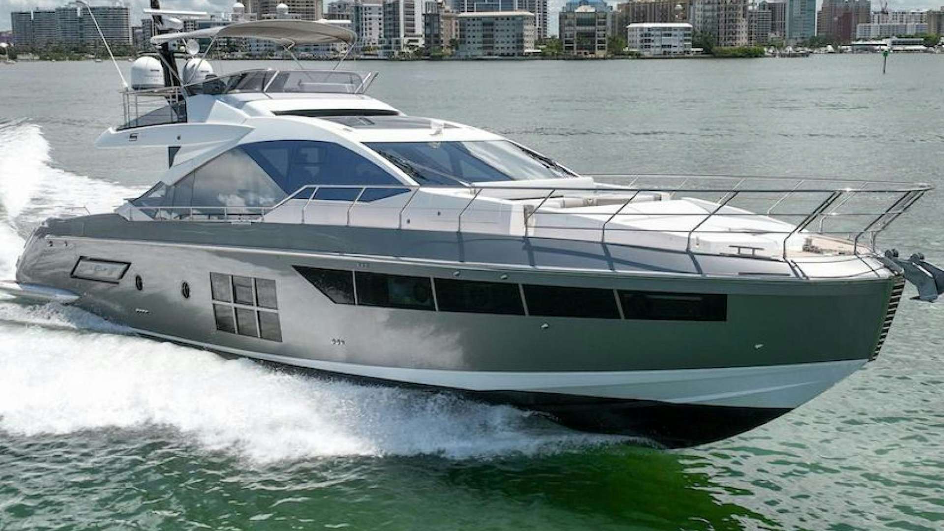 a white yacht on the water aboard ZERO DIMENSION Yacht for Sale