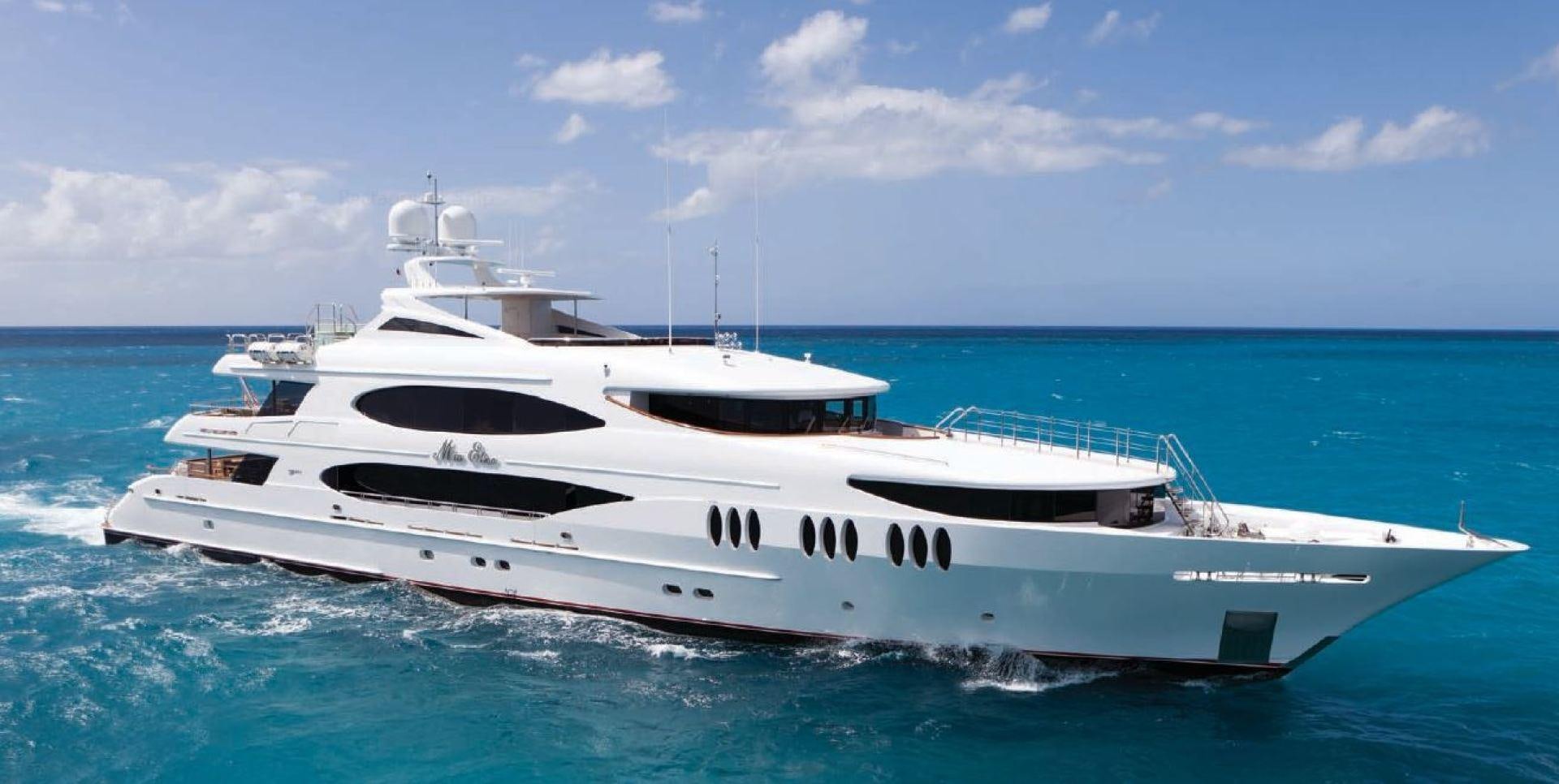 a white yacht in the water aboard TRINITY T052 Yacht for Sale