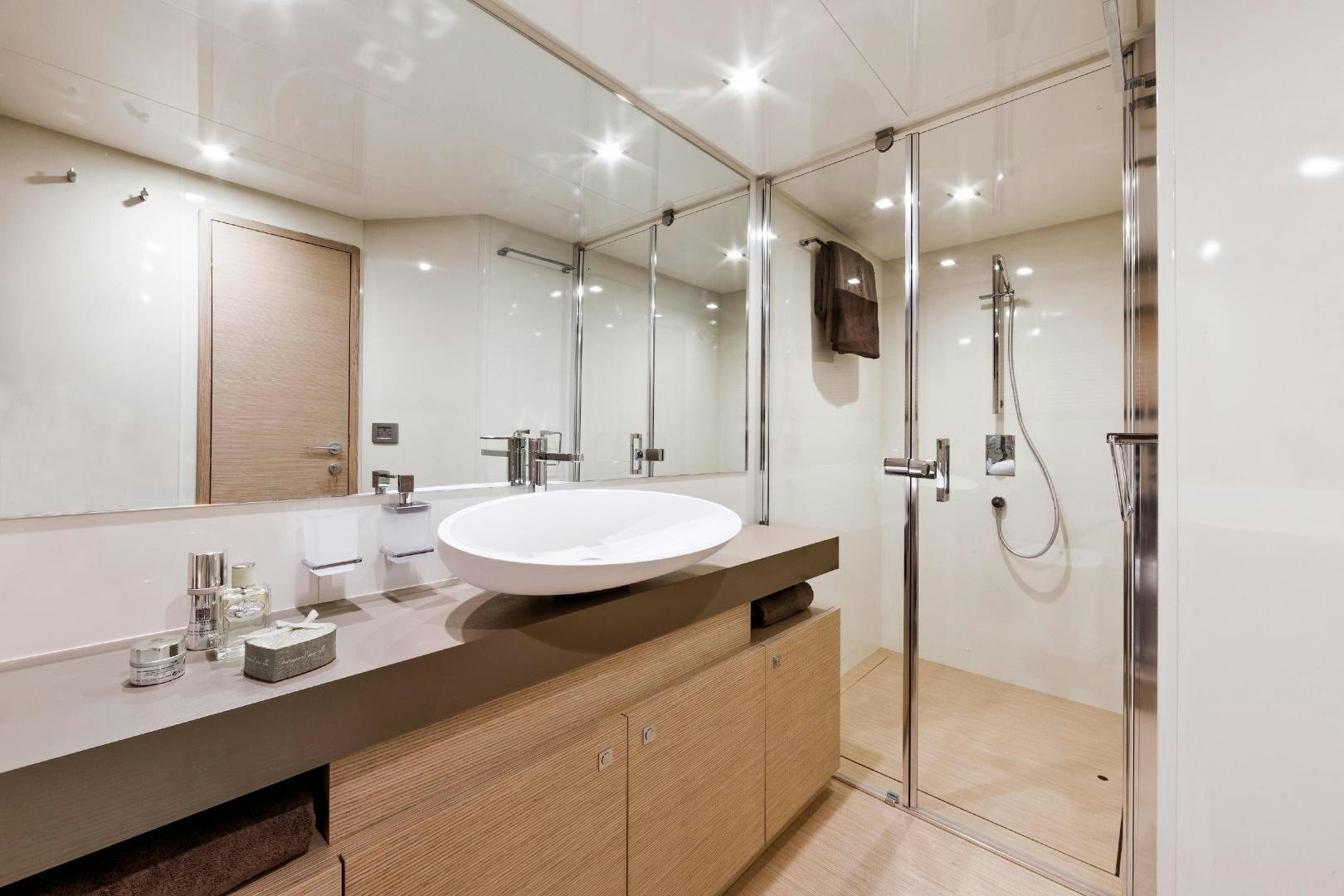 a bathroom with a sink and a shower aboard FERRETTI  Yacht for Sale