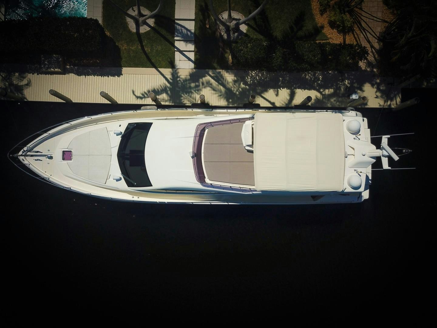 a car with a white stripe aboard FERRETTI  Yacht for Sale
