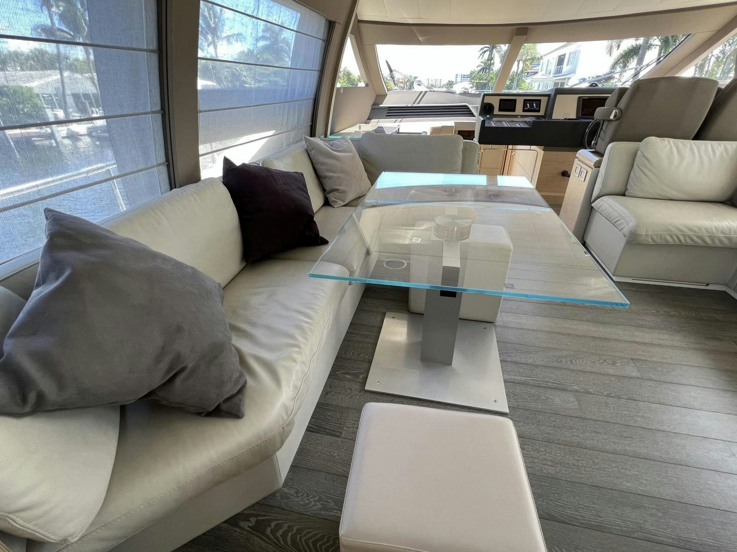 a living room with a couch and a table aboard FERRETTI  Yacht for Sale