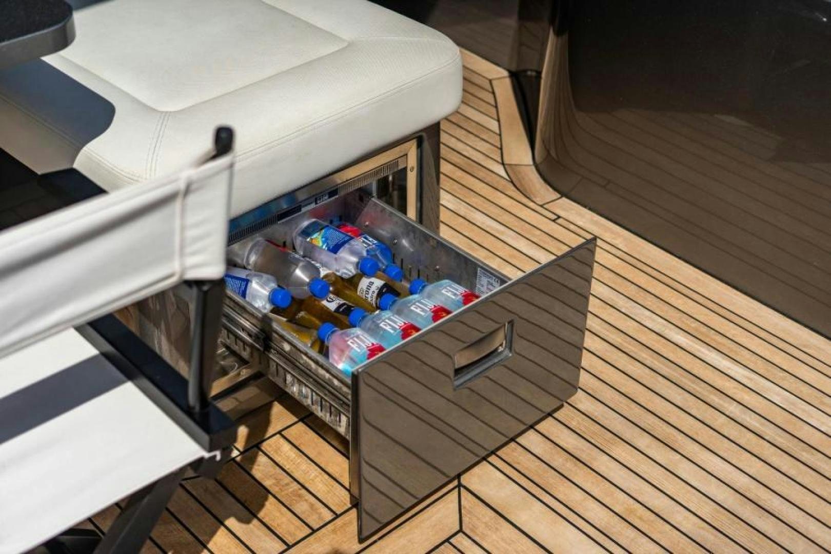 a metal box with a drawer and a drawer with a drawer and a shelf with objects on it aboard MARCHELLY Yacht for Sale