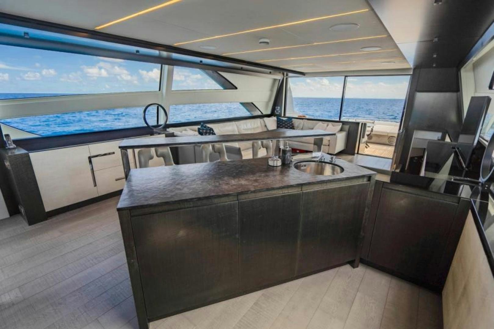 a kitchen with a large window aboard MARCHELLY Yacht for Sale