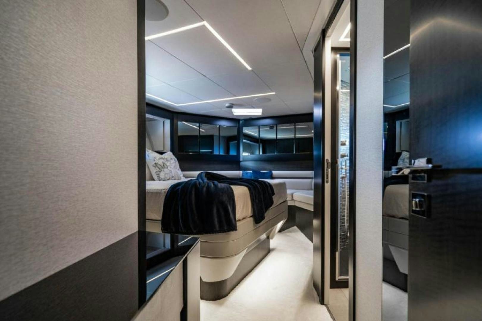 a room with a bed and a desk aboard MARCHELLY Yacht for Sale