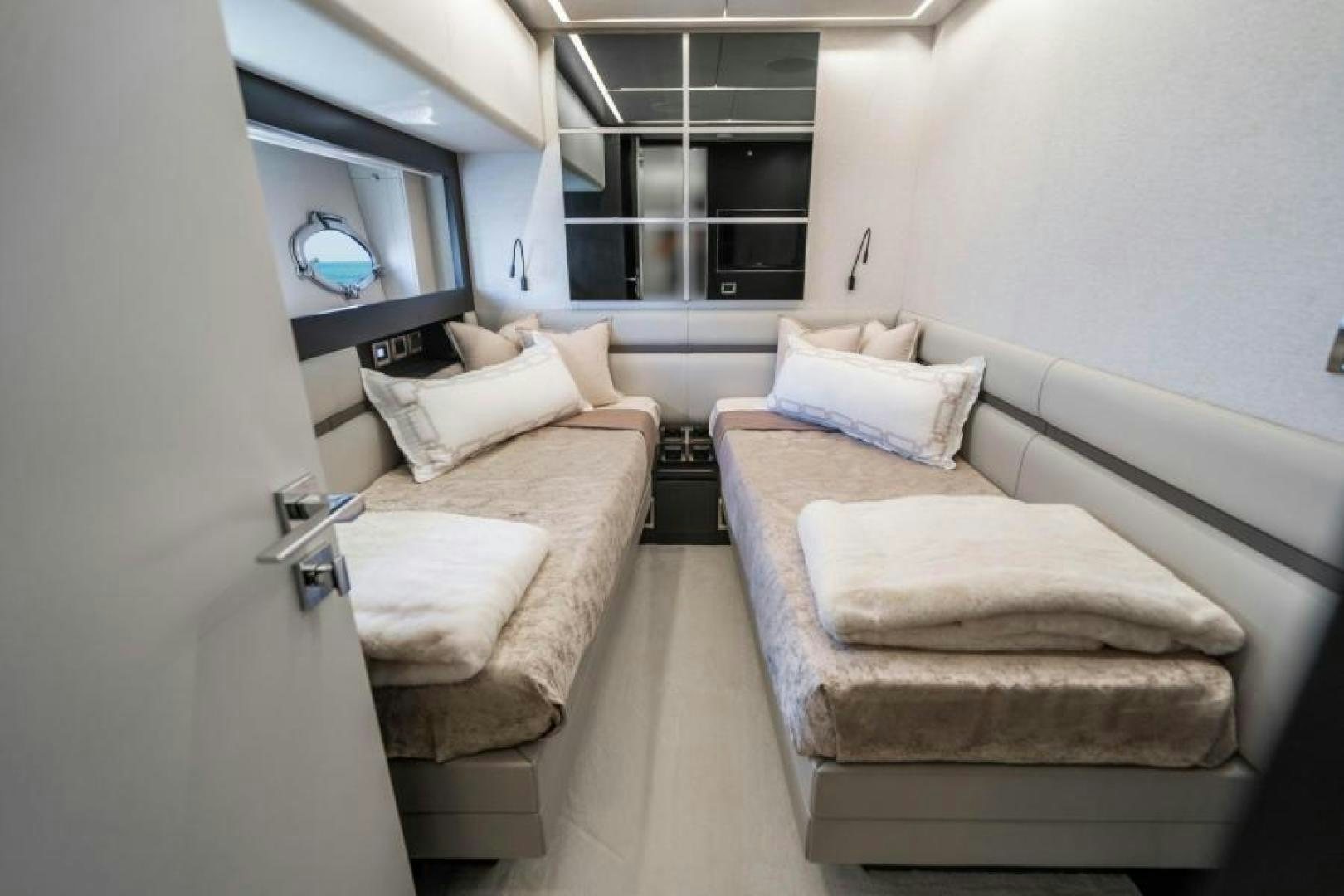 a room with a bed and a couch aboard MARCHELLY Yacht for Sale