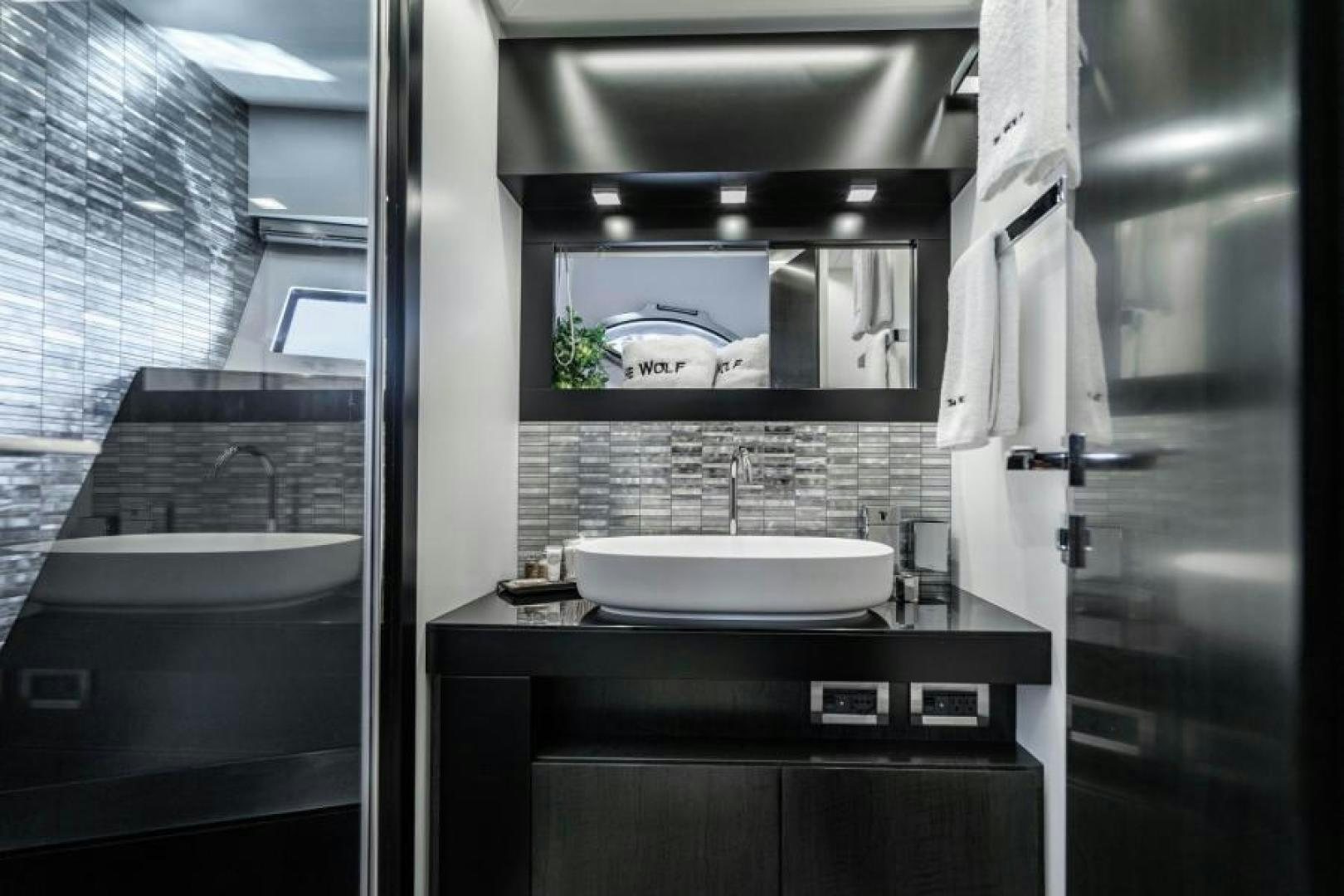 a bathroom with a sink and a mirror aboard MARCHELLY Yacht for Sale