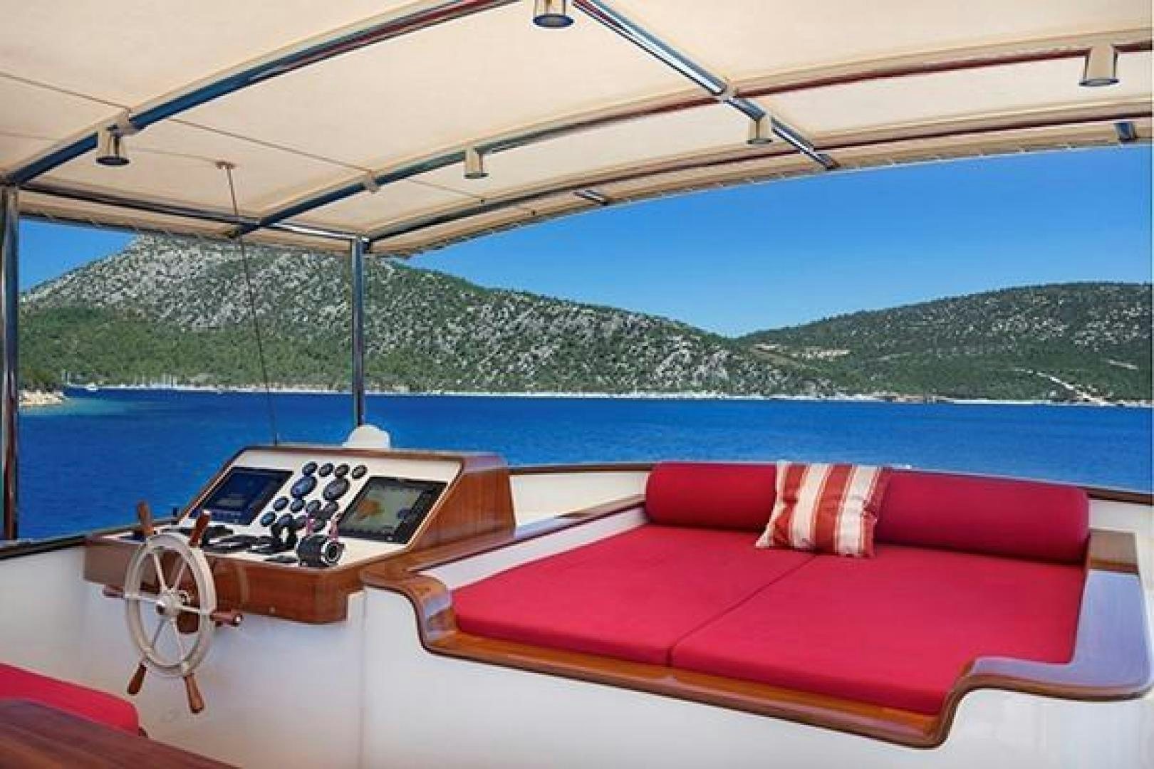 a boat with a laptop on it aboard DARWIN Yacht for Sale