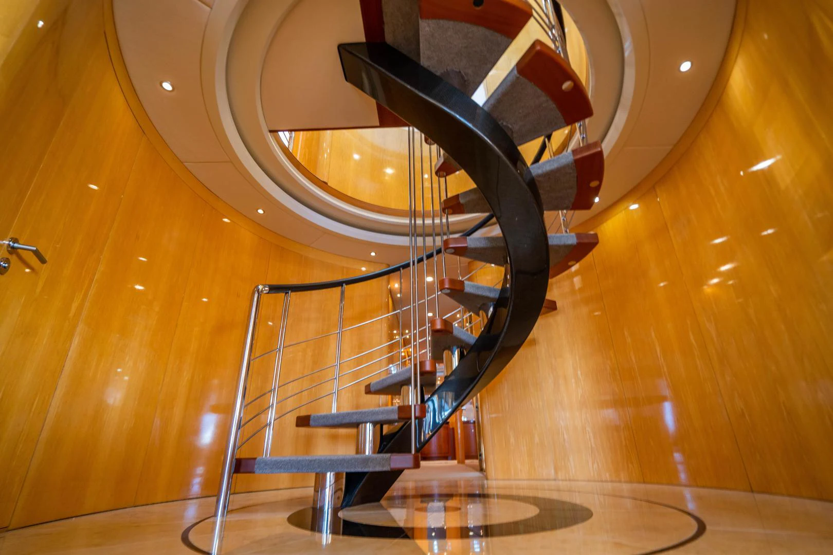 a staircase with a metal railing aboard MY SPIRIT Yacht for Sale