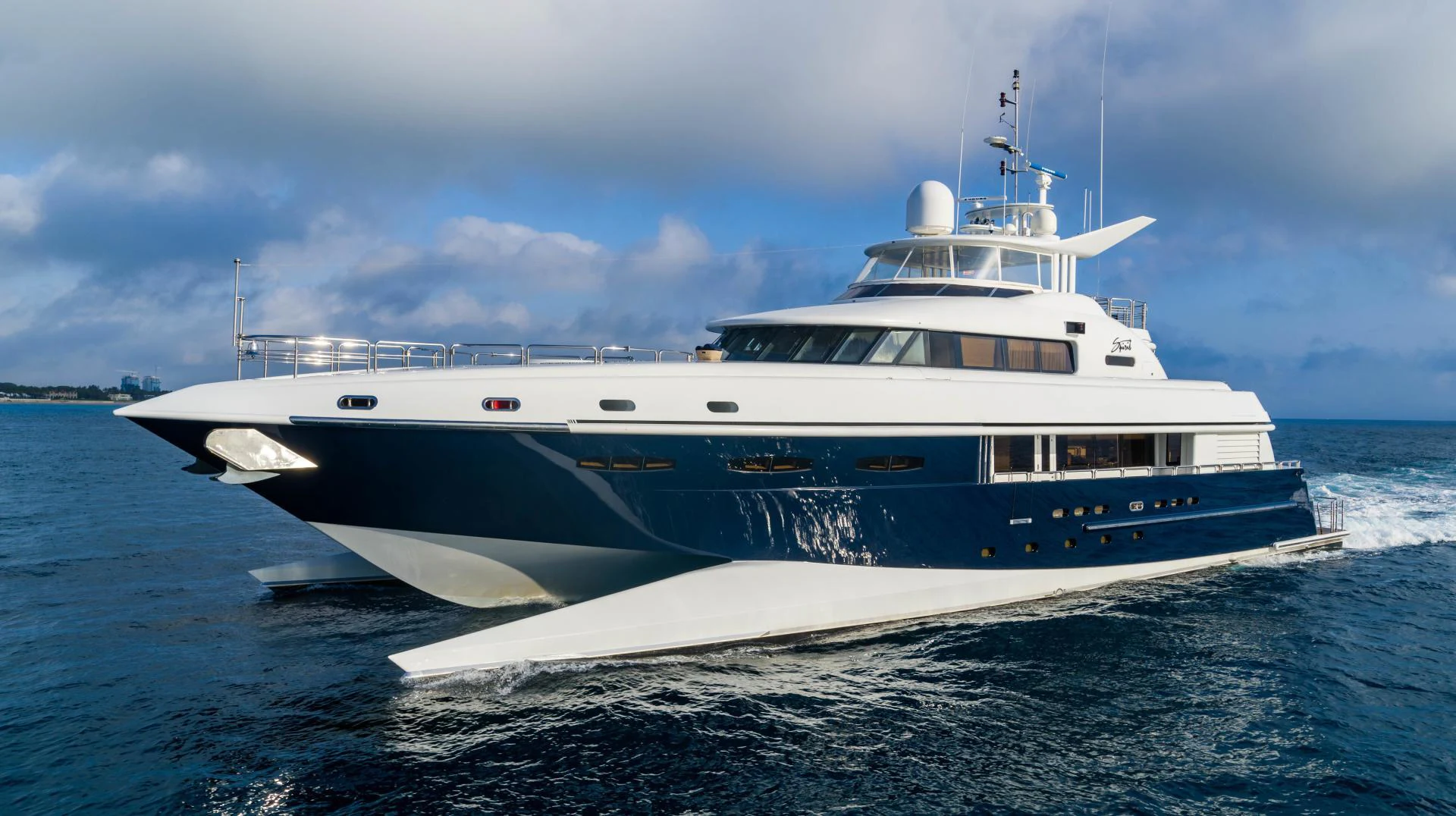 a white yacht on the water aboard MY SPIRIT Yacht for Sale