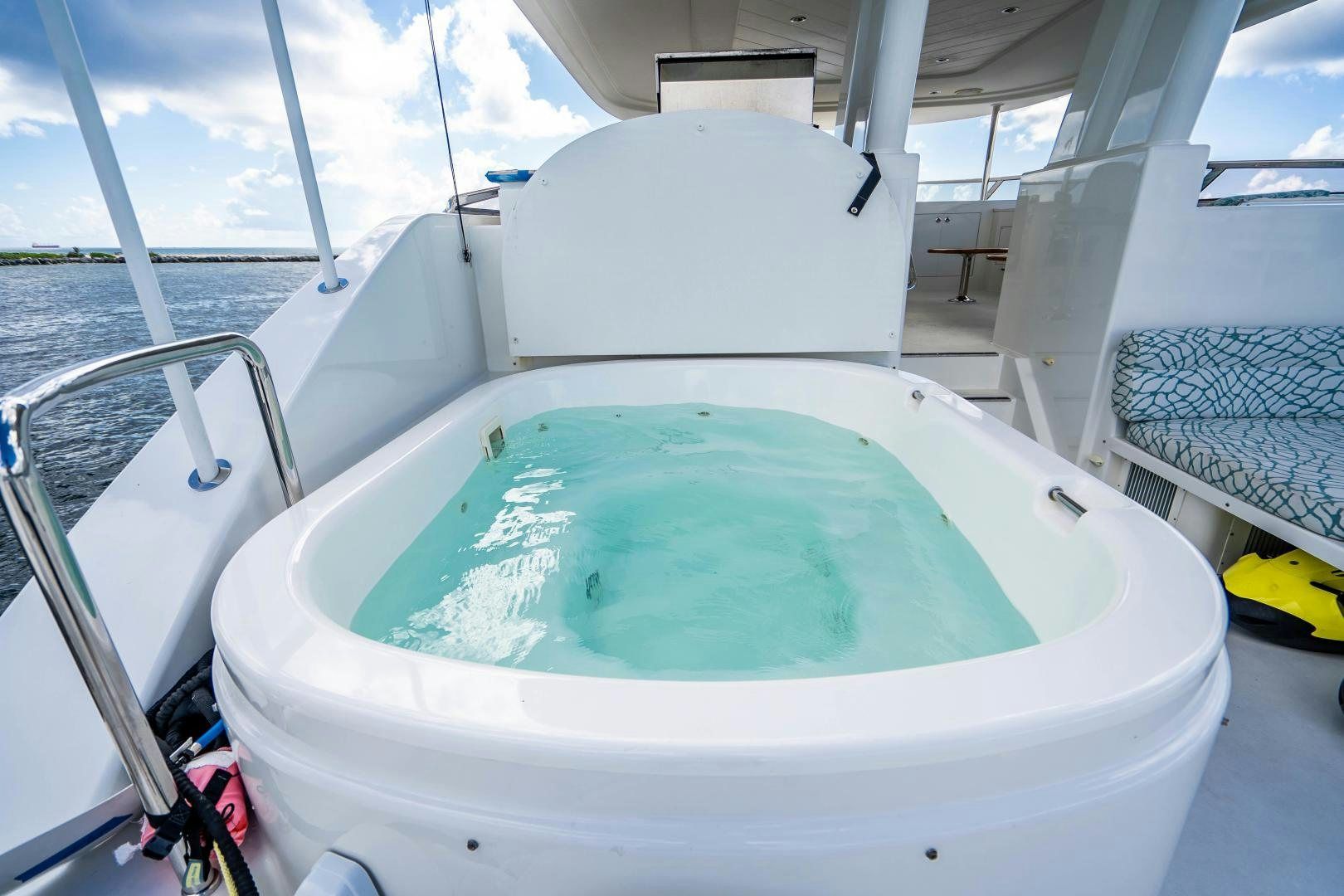 a white tub with blue water aboard WILD KINGDOM Yacht for Sale