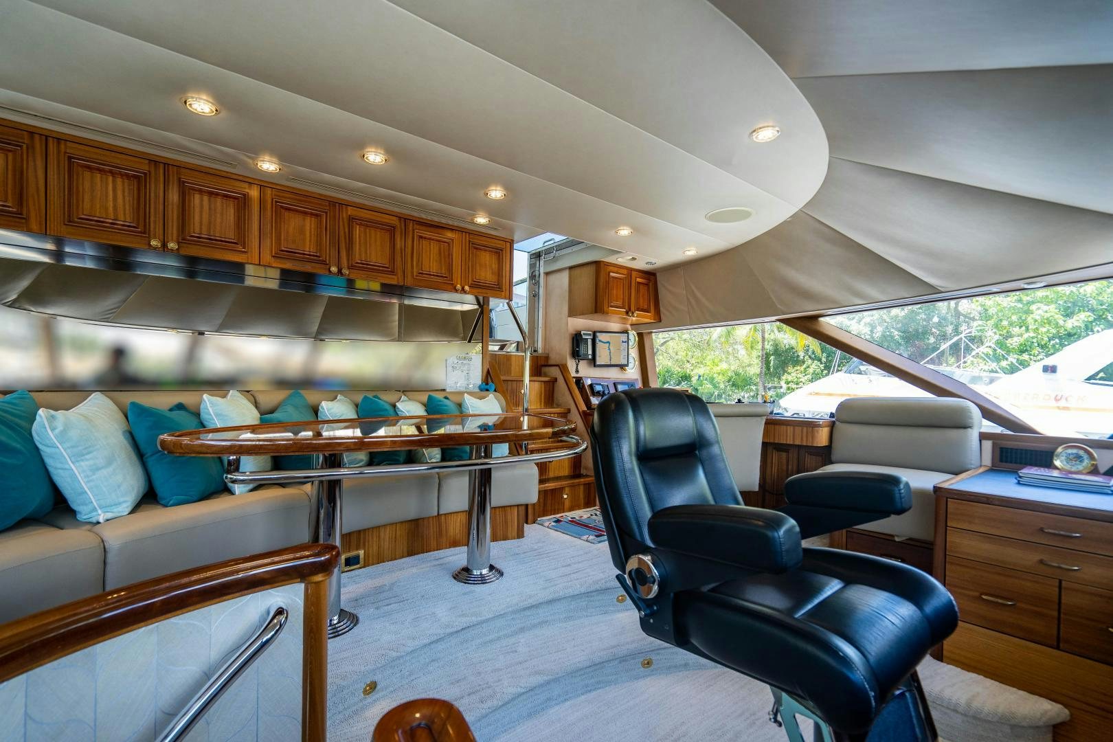 a large kitchen with a large island aboard WILD KINGDOM Yacht for Sale