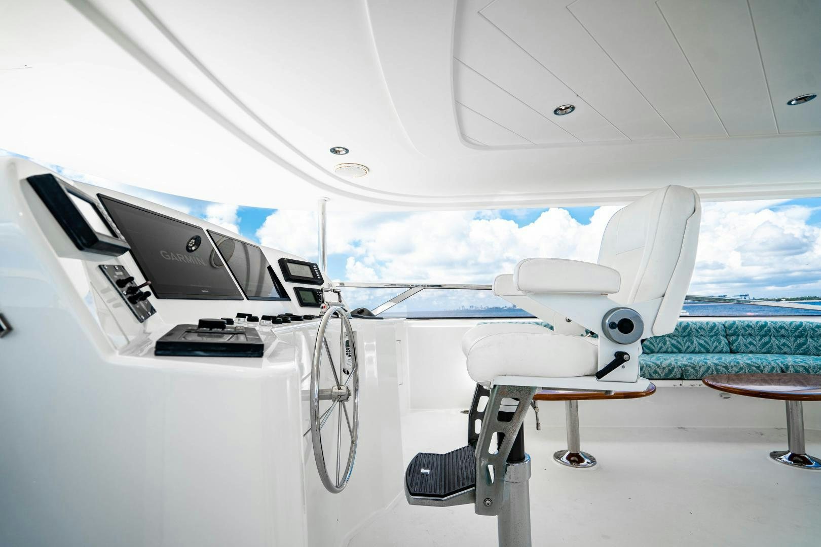 a white boat with a satellite dish aboard WILD KINGDOM Yacht for Sale