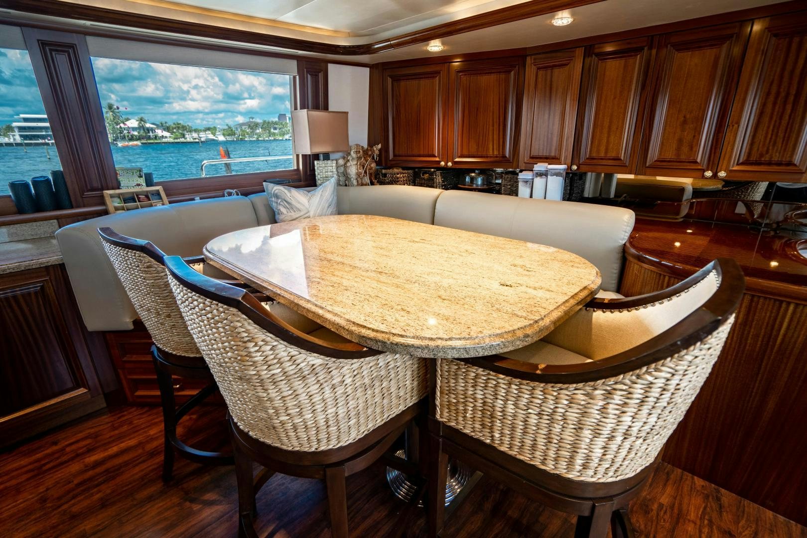 a dining room with a table and chairs aboard WILD KINGDOM Yacht for Sale