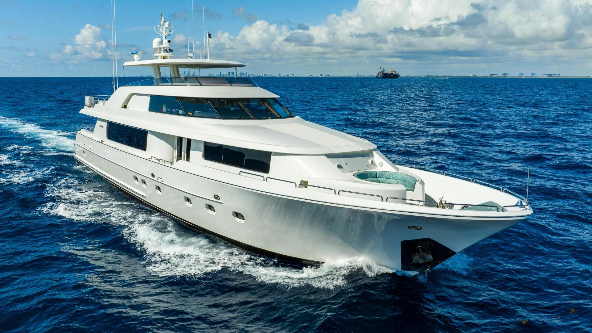 a white yacht on the water aboard WILD KINGDOM Yacht for Sale