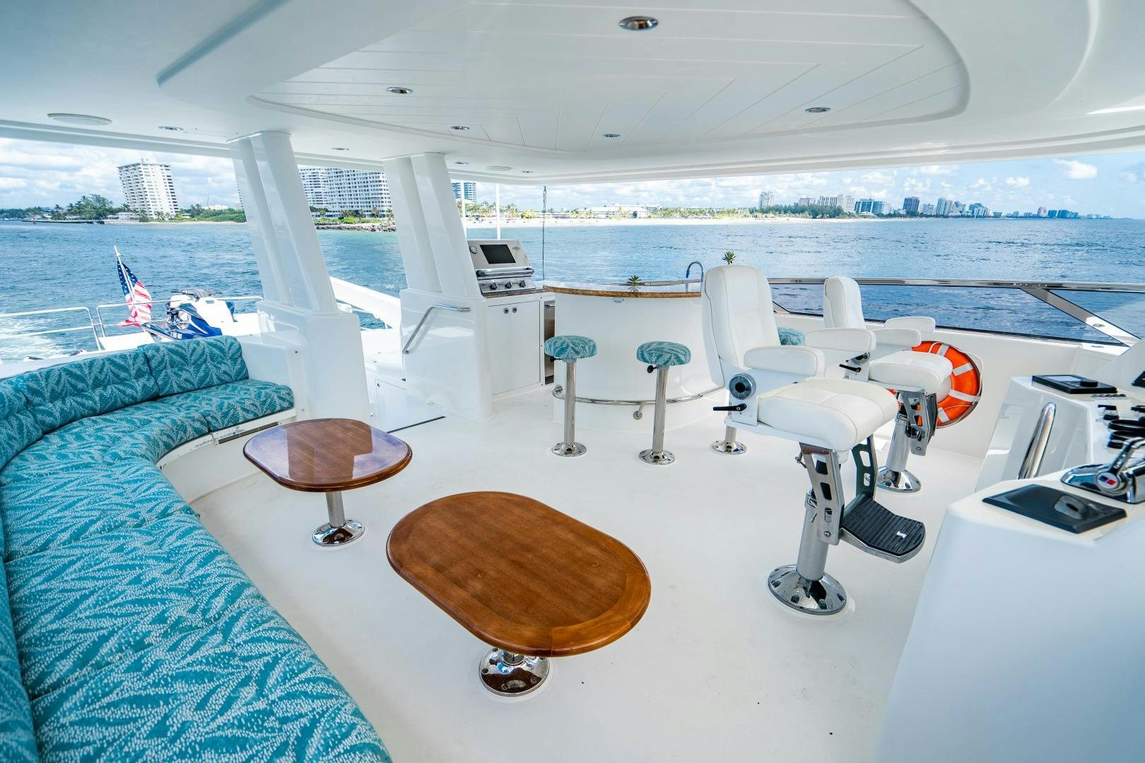 a room with chairs and tables aboard WILD KINGDOM Yacht for Sale