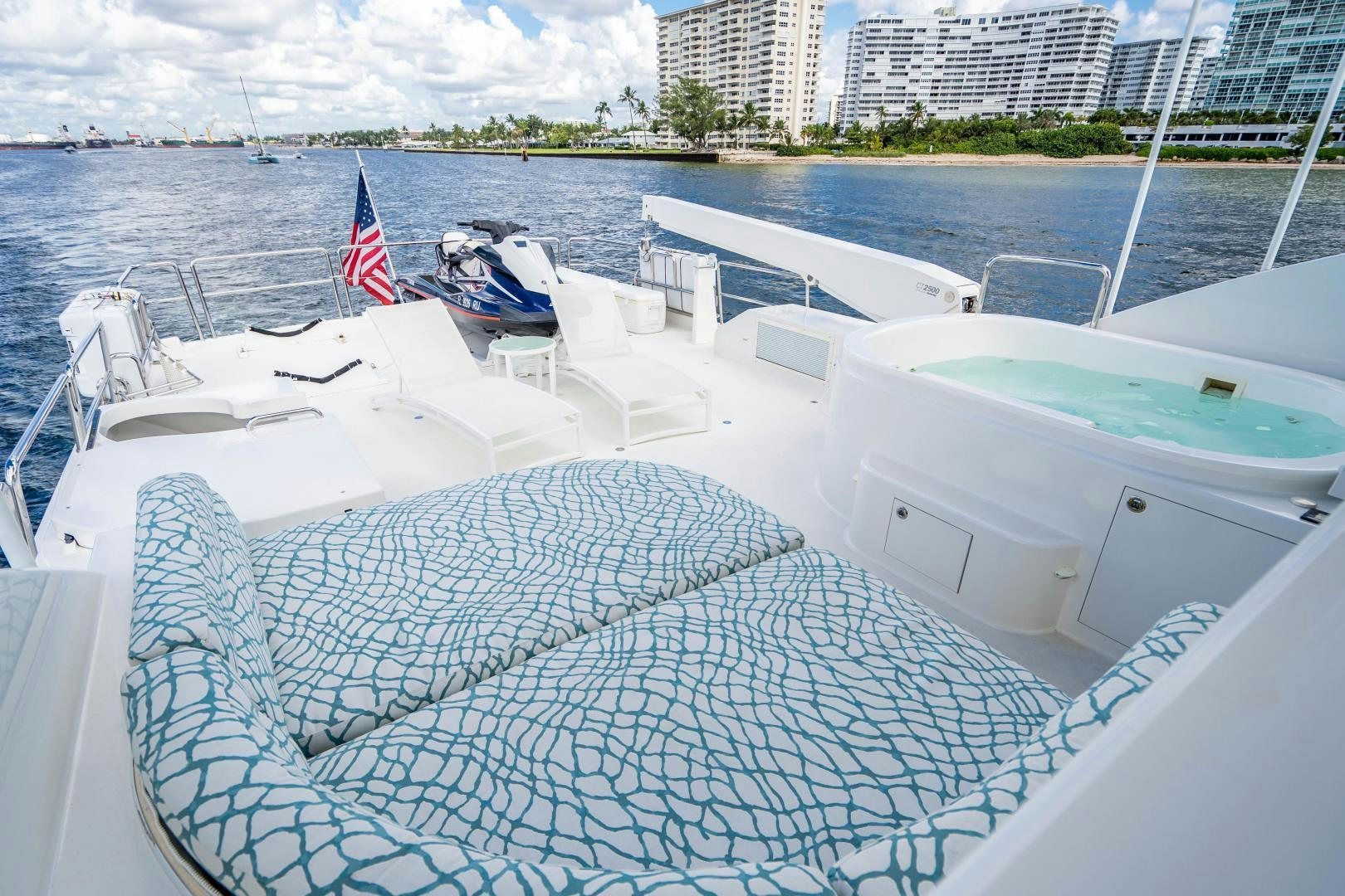 a boat with a flag on it aboard WILD KINGDOM Yacht for Sale