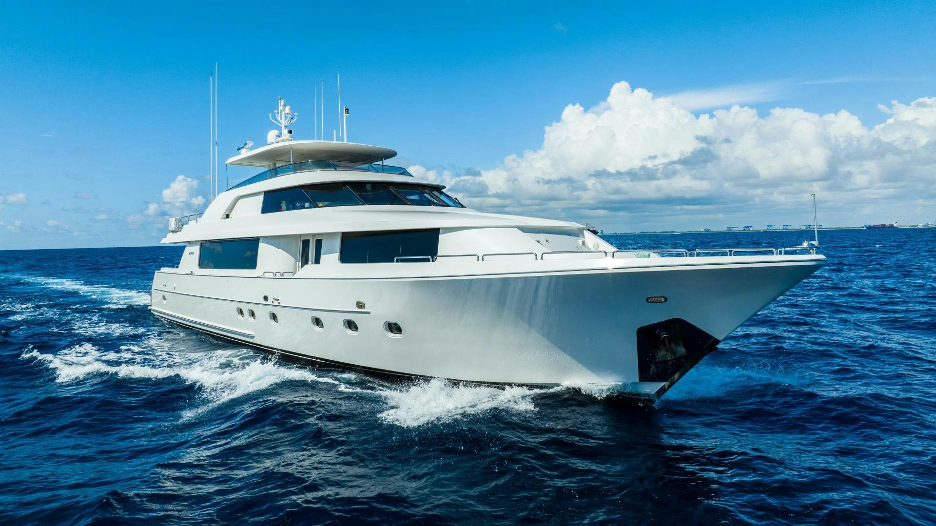 a white yacht in the water aboard WILD KINGDOM Yacht for Sale