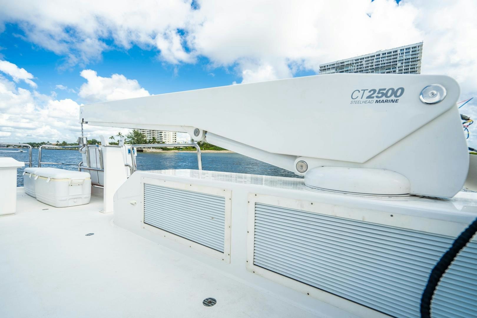 a white boat on a trailer aboard WILD KINGDOM Yacht for Sale