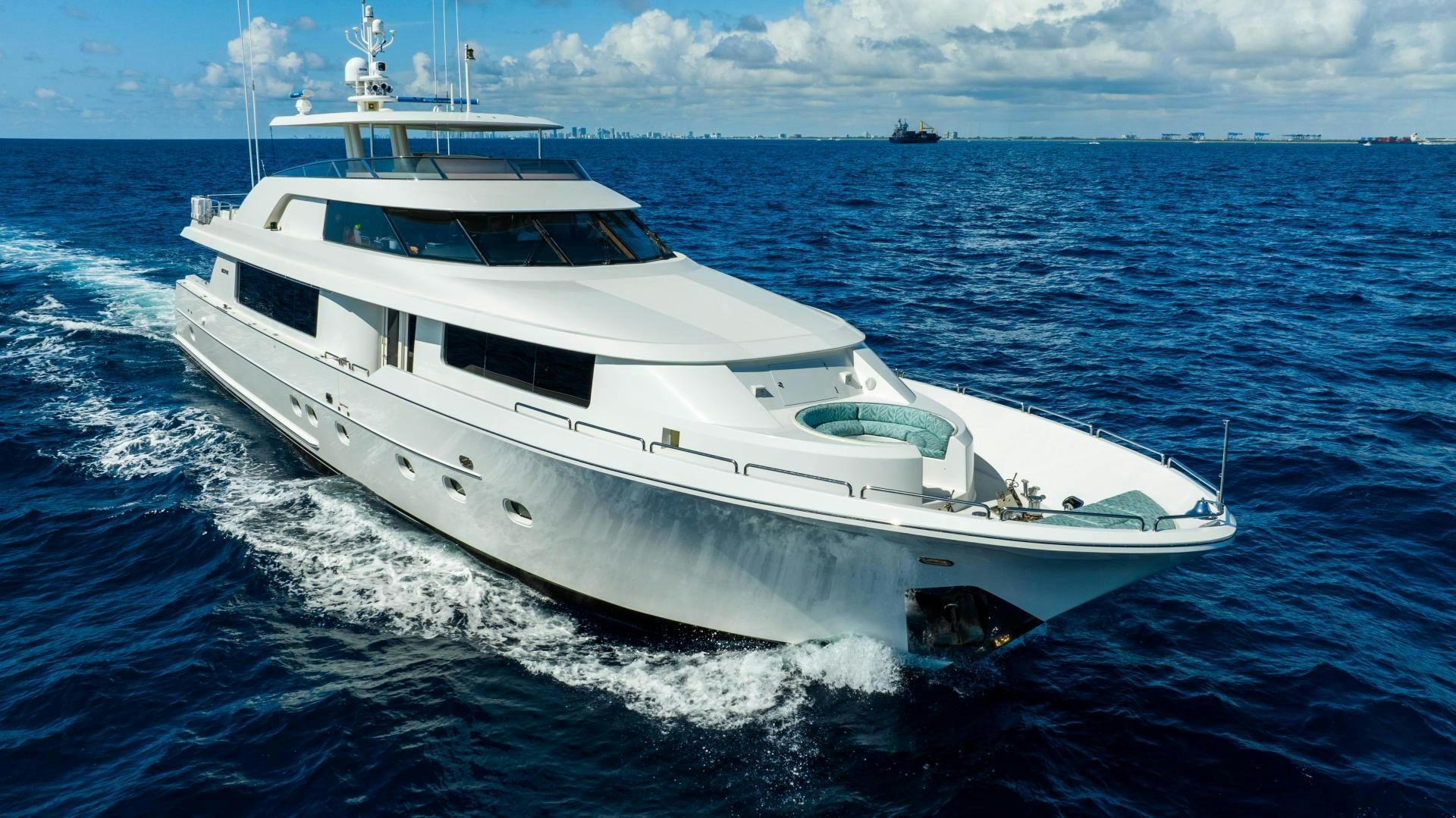 a white yacht on the water aboard WILD KINGDOM Yacht for Sale
