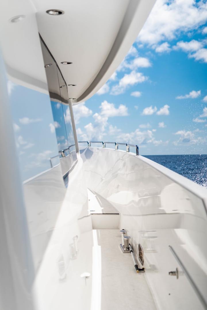 a white boat with a metal frame aboard WILD KINGDOM Yacht for Sale